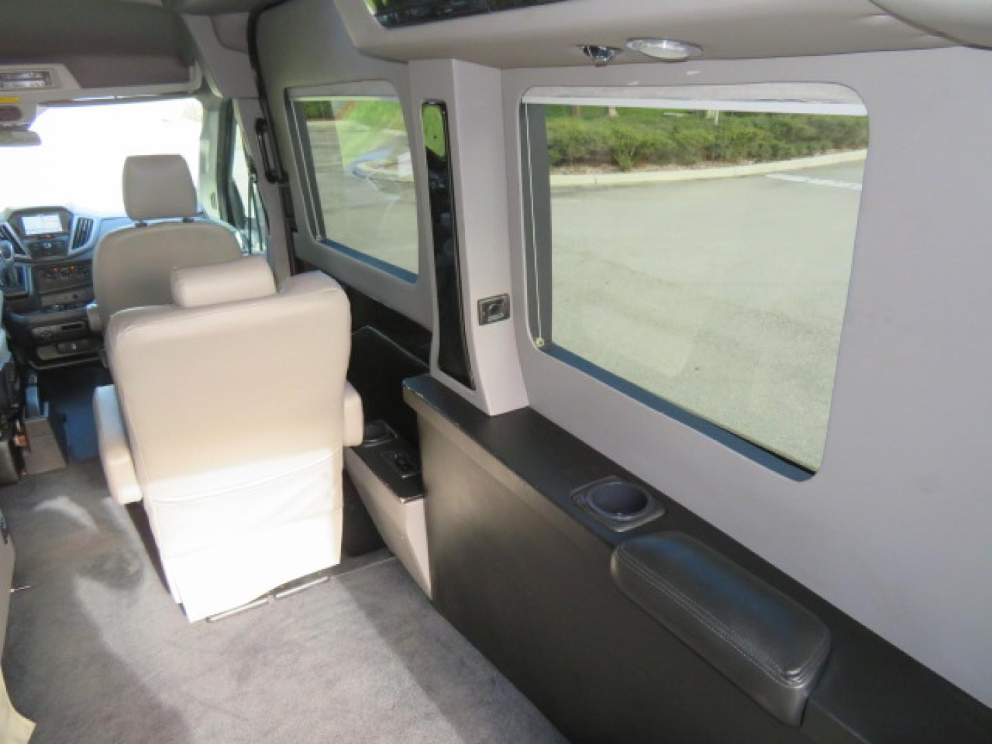 2017 Black /Gray Ford Transit 250 Van Med. Roof w/Sliding Pass. 148-in. WB (1FTYR2CGXHK) with an 3.5L V6 DOHC 24V engine, 6A transmission, located at 4301 Oak Circle #19, Boca Raton, FL, 33431, (954) 561-2499, 26.388472, -80.084045 - You are looking at a Gorgeous 2017 Ford Transit T250 Medium Roof Sherrod Handicap Wheelchair Conversion Van Fully Loaded With 32K Original Miles, Rear Entry Braunability Power Foldout Wheelchair Lift, Q Lock QLK150 Docking System for the wheelchair, Beautiful Gray Leather Interior, Rear Entertainmen - Photo#48