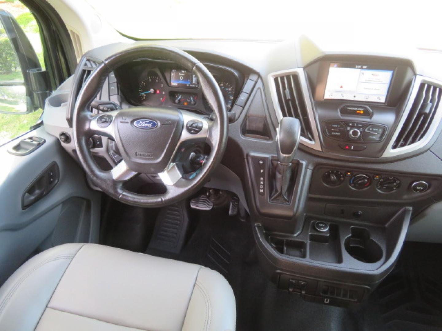 2017 Black /Gray Ford Transit 250 Van Med. Roof w/Sliding Pass. 148-in. WB (1FTYR2CGXHK) with an 3.5L V6 DOHC 24V engine, 6A transmission, located at 4301 Oak Circle #19, Boca Raton, FL, 33431, (954) 561-2499, 26.388472, -80.084045 - You are looking at a Gorgeous 2017 Ford Transit T250 Medium Roof Sherrod Handicap Wheelchair Conversion Van Fully Loaded With 32K Original Miles, Rear Entry Braunability Power Foldout Wheelchair Lift, Q Lock QLK150 Docking System for the wheelchair, Beautiful Gray Leather Interior, Rear Entertainmen - Photo#55