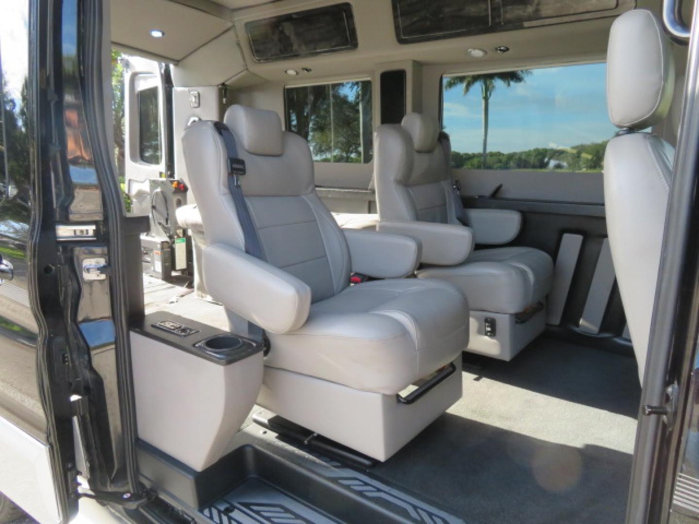 2017 Black /Gray Ford Transit 250 Van Med. Roof w/Sliding Pass. 148-in. WB (1FTYR2CGXHK) with an 3.5L V6 DOHC 24V engine, 6A transmission, located at 4301 Oak Circle #19, Boca Raton, FL, 33431, (954) 561-2499, 26.388472, -80.084045 - You are looking at a Gorgeous 2017 Ford Transit T250 Medium Roof Sherrod Handicap Wheelchair Conversion Van Fully Loaded With 32K Original Miles, Rear Entry Braunability Power Foldout Wheelchair Lift, Q Lock QLK150 Docking System for the wheelchair, Beautiful Gray Leather Interior, Rear Entertainmen - Photo#66