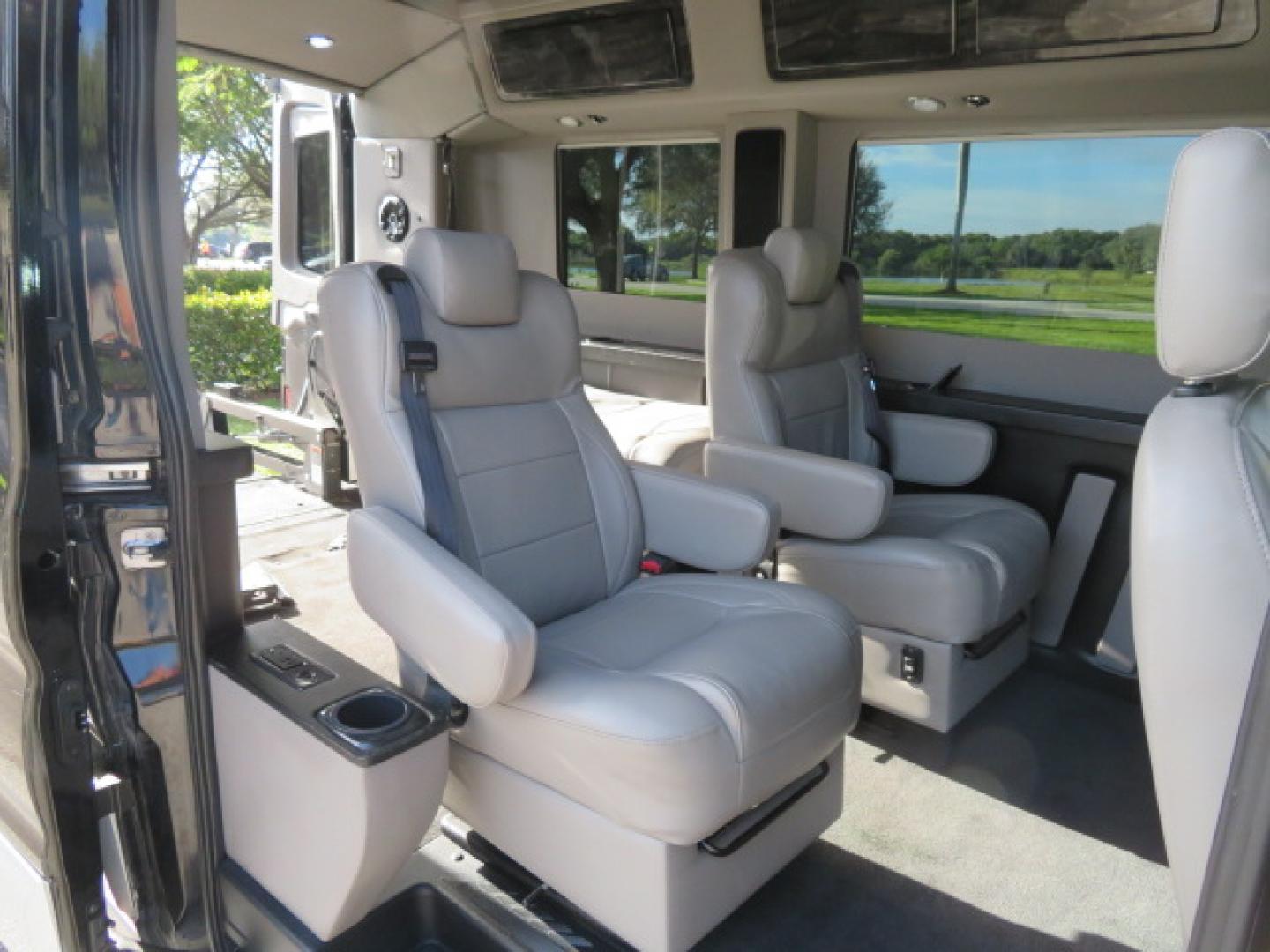 2017 Black /Gray Ford Transit 250 Van Med. Roof w/Sliding Pass. 148-in. WB (1FTYR2CGXHK) with an 3.5L V6 DOHC 24V engine, 6A transmission, located at 4301 Oak Circle #19, Boca Raton, FL, 33431, (954) 561-2499, 26.388472, -80.084045 - You are looking at a Gorgeous 2017 Ford Transit T250 Medium Roof Sherrod Handicap Wheelchair Conversion Van Fully Loaded With 32K Original Miles, Rear Entry Braunability Power Foldout Wheelchair Lift, Q Lock QLK150 Docking System for the wheelchair, Beautiful Gray Leather Interior, Rear Entertainmen - Photo#67