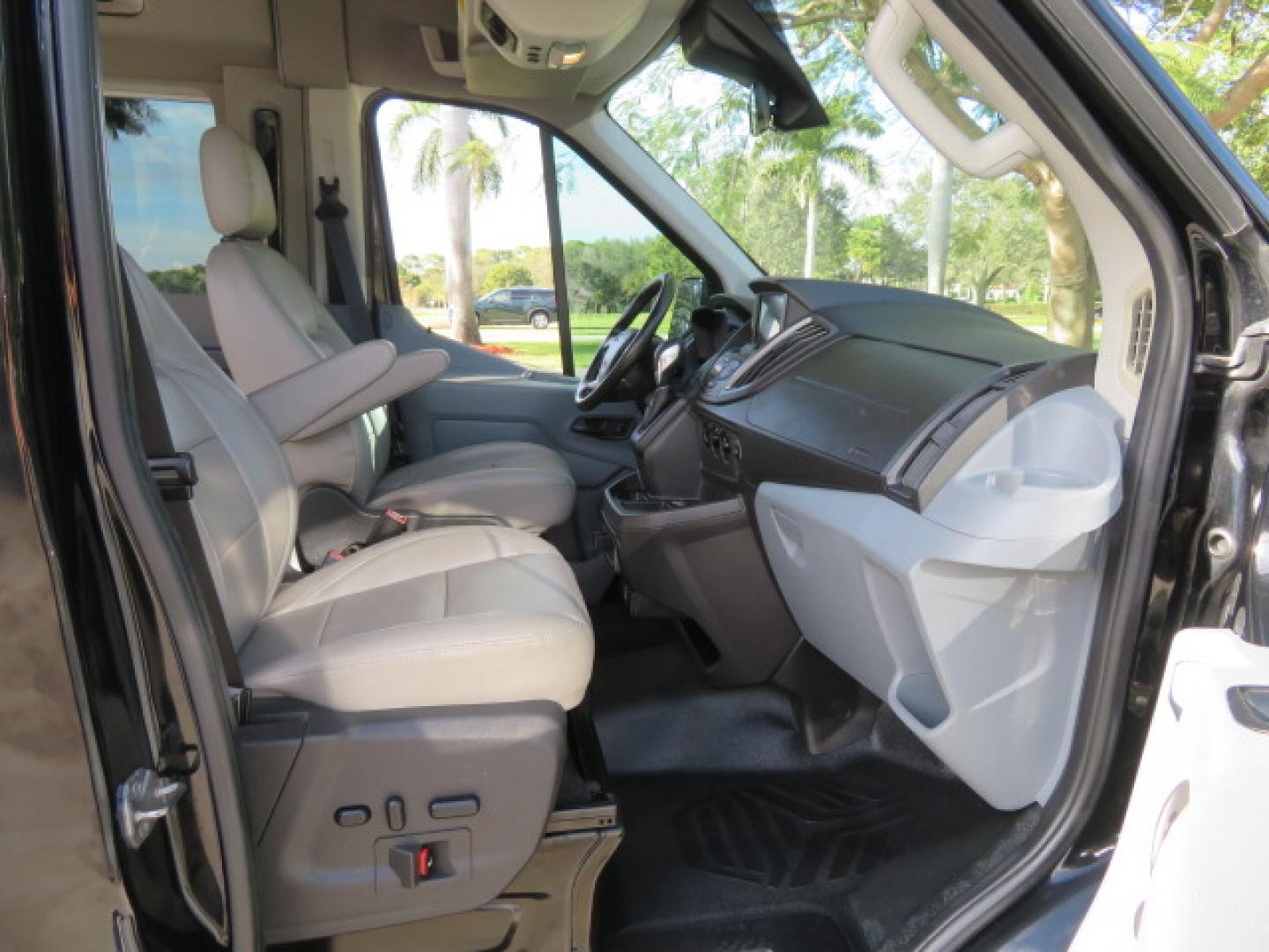 2017 Black /Gray Ford Transit 250 Van Med. Roof w/Sliding Pass. 148-in. WB (1FTYR2CGXHK) with an 3.5L V6 DOHC 24V engine, 6A transmission, located at 4301 Oak Circle #19, Boca Raton, FL, 33431, (954) 561-2499, 26.388472, -80.084045 - You are looking at a Gorgeous 2017 Ford Transit T250 Medium Roof Sherrod Handicap Wheelchair Conversion Van Fully Loaded With 32K Original Miles, Rear Entry Braunability Power Foldout Wheelchair Lift, Q Lock QLK150 Docking System for the wheelchair, Beautiful Gray Leather Interior, Rear Entertainmen - Photo#68