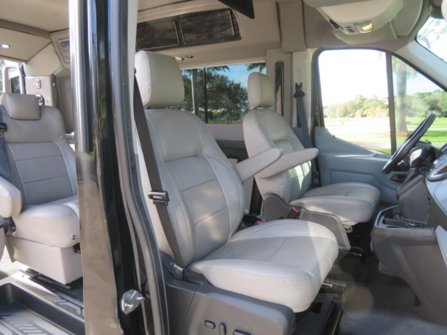 2017 Black /Gray Ford Transit 250 Van Med. Roof w/Sliding Pass. 148-in. WB (1FTYR2CGXHK) with an 3.5L V6 DOHC 24V engine, 6A transmission, located at 4301 Oak Circle #19, Boca Raton, FL, 33431, (954) 561-2499, 26.388472, -80.084045 - You are looking at a Gorgeous 2017 Ford Transit T250 Medium Roof Sherrod Handicap Wheelchair Conversion Van Fully Loaded With 32K Original Miles, Rear Entry Braunability Power Foldout Wheelchair Lift, Q Lock QLK150 Docking System for the wheelchair, Beautiful Gray Leather Interior, Rear Entertainmen - Photo#69