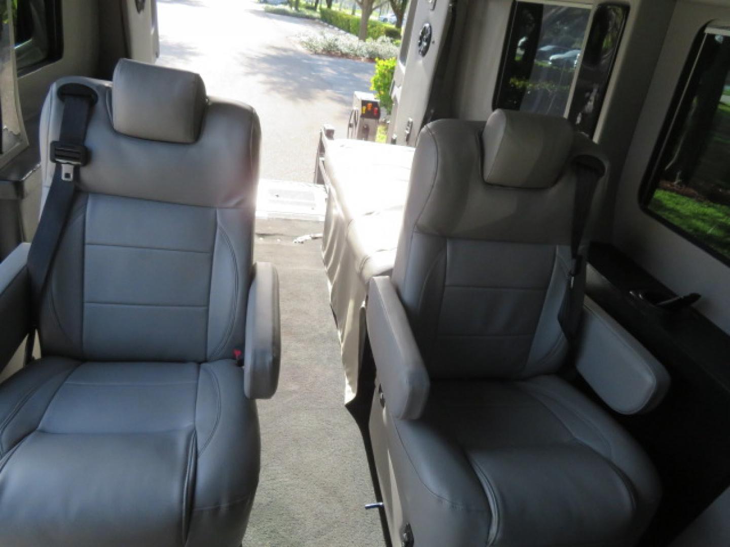 2017 Black /Gray Ford Transit 250 Van Med. Roof w/Sliding Pass. 148-in. WB (1FTYR2CGXHK) with an 3.5L V6 DOHC 24V engine, 6A transmission, located at 4301 Oak Circle #19, Boca Raton, FL, 33431, (954) 561-2499, 26.388472, -80.084045 - You are looking at a Gorgeous 2017 Ford Transit T250 Medium Roof Sherrod Handicap Wheelchair Conversion Van Fully Loaded With 32K Original Miles, Rear Entry Braunability Power Foldout Wheelchair Lift, Q Lock QLK150 Docking System for the wheelchair, Beautiful Gray Leather Interior, Rear Entertainmen - Photo#70