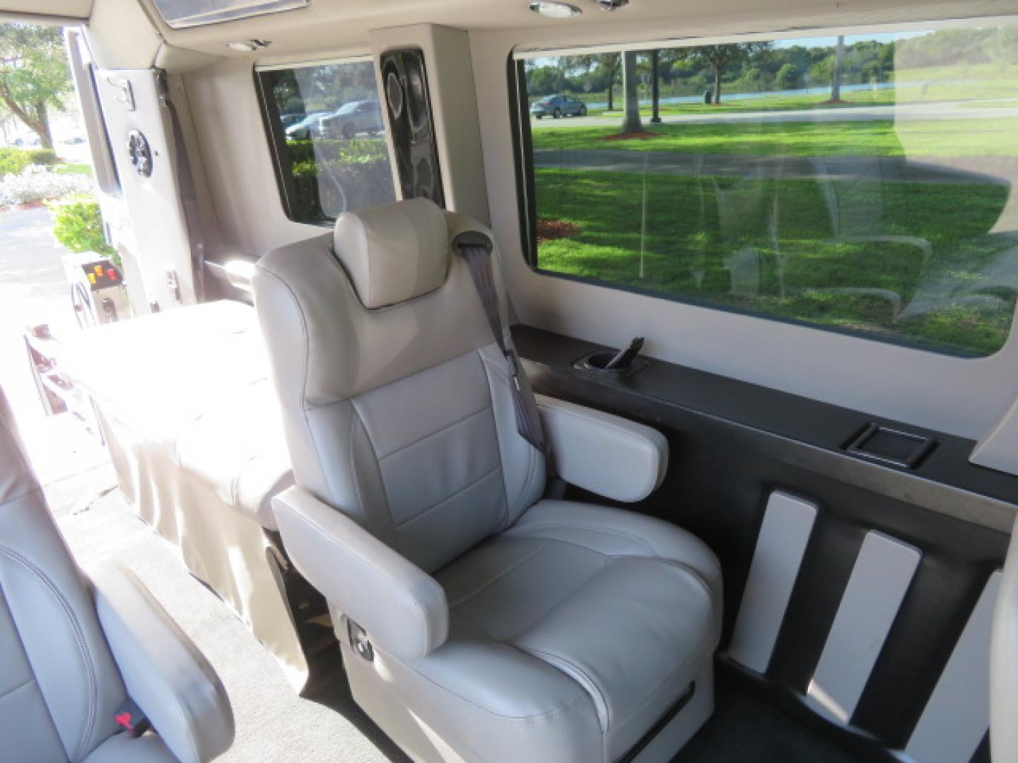 2017 Black /Gray Ford Transit 250 Van Med. Roof w/Sliding Pass. 148-in. WB (1FTYR2CGXHK) with an 3.5L V6 DOHC 24V engine, 6A transmission, located at 4301 Oak Circle #19, Boca Raton, FL, 33431, (954) 561-2499, 26.388472, -80.084045 - You are looking at a Gorgeous 2017 Ford Transit T250 Medium Roof Sherrod Handicap Wheelchair Conversion Van Fully Loaded With 32K Original Miles, Rear Entry Braunability Power Foldout Wheelchair Lift, Q Lock QLK150 Docking System for the wheelchair, Beautiful Gray Leather Interior, Rear Entertainmen - Photo#71