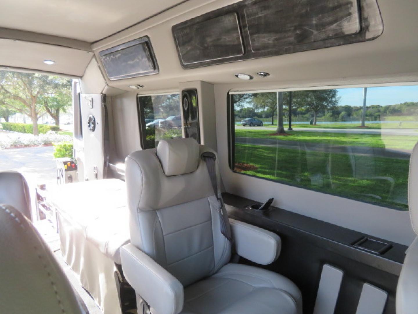 2017 Black /Gray Ford Transit 250 Van Med. Roof w/Sliding Pass. 148-in. WB (1FTYR2CGXHK) with an 3.5L V6 DOHC 24V engine, 6A transmission, located at 4301 Oak Circle #19, Boca Raton, FL, 33431, (954) 561-2499, 26.388472, -80.084045 - You are looking at a Gorgeous 2017 Ford Transit T250 Medium Roof Sherrod Handicap Wheelchair Conversion Van Fully Loaded With 32K Original Miles, Rear Entry Braunability Power Foldout Wheelchair Lift, Q Lock QLK150 Docking System for the wheelchair, Beautiful Gray Leather Interior, Rear Entertainmen - Photo#72