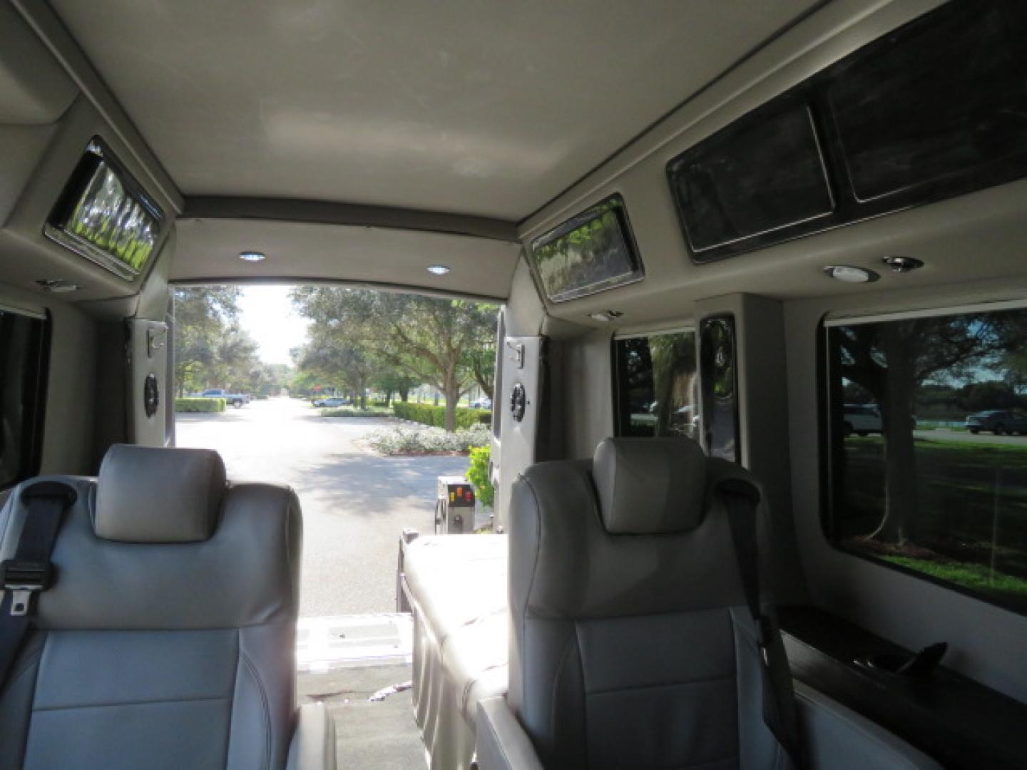 2017 Black /Gray Ford Transit 250 Van Med. Roof w/Sliding Pass. 148-in. WB (1FTYR2CGXHK) with an 3.5L V6 DOHC 24V engine, 6A transmission, located at 4301 Oak Circle #19, Boca Raton, FL, 33431, (954) 561-2499, 26.388472, -80.084045 - You are looking at a Gorgeous 2017 Ford Transit T250 Medium Roof Sherrod Handicap Wheelchair Conversion Van Fully Loaded With 32K Original Miles, Rear Entry Braunability Power Foldout Wheelchair Lift, Q Lock QLK150 Docking System for the wheelchair, Beautiful Gray Leather Interior, Rear Entertainmen - Photo#73