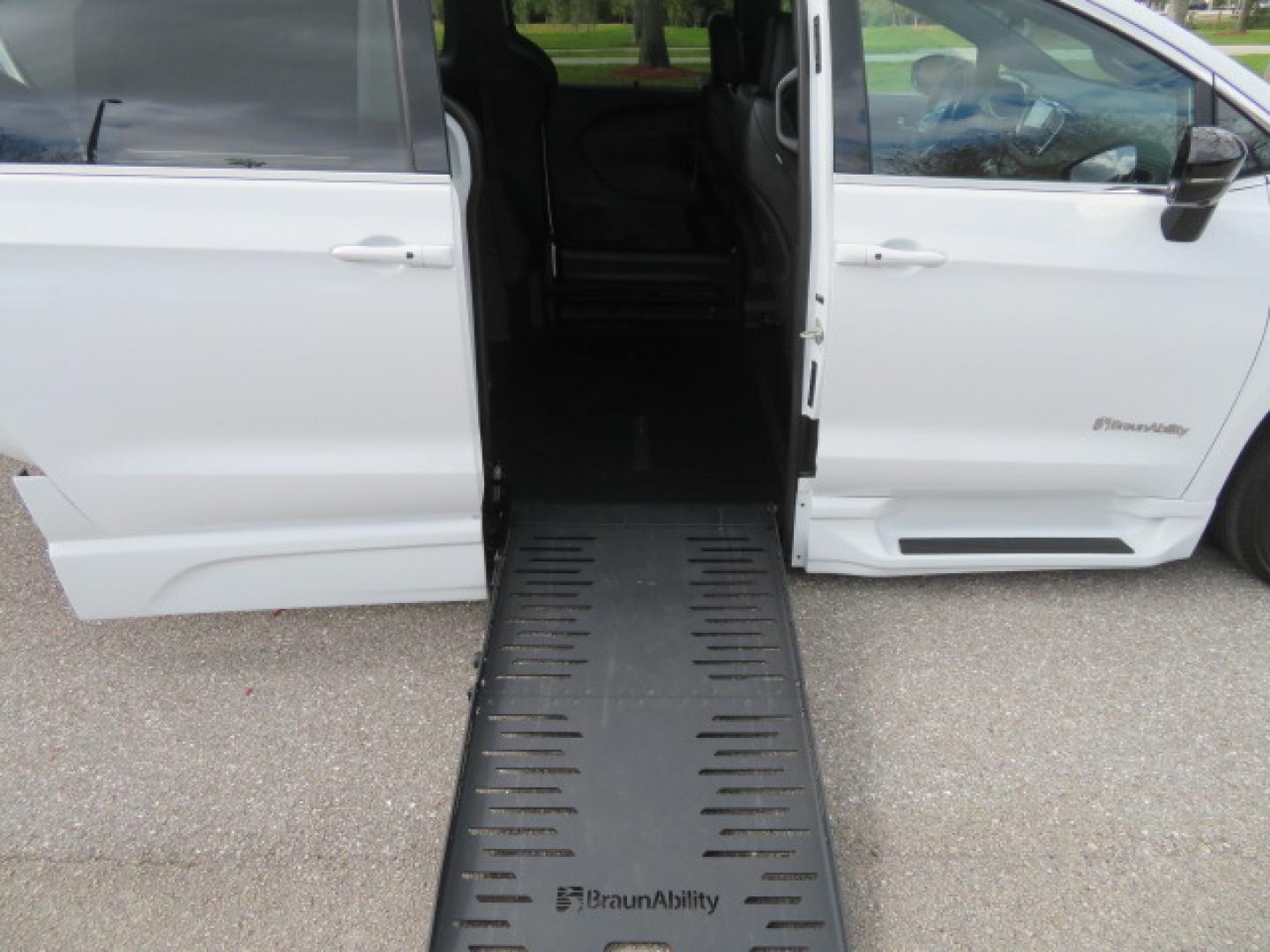 2025 White /Black Chrysler Pacifica Select (2C4RC1BG6SR) with an 3.6L V6 DOHC 24V engine, 9A transmission, located at 4301 Oak Circle #19, Boca Raton, FL, 33431, (954) 561-2499, 26.388472, -80.084045 - 2025 CHRYSLER PACIFICA SELECT Braunability Handicap Wheelchair Conversion with 280 Original Miles. Braun Power Foldout XT Ramp System. Clean Carfax No Stories. This van is Brand New. Still has original plastic from the facotry. Purchased new in November and the van was sold due to unfortunate circum - Photo#40