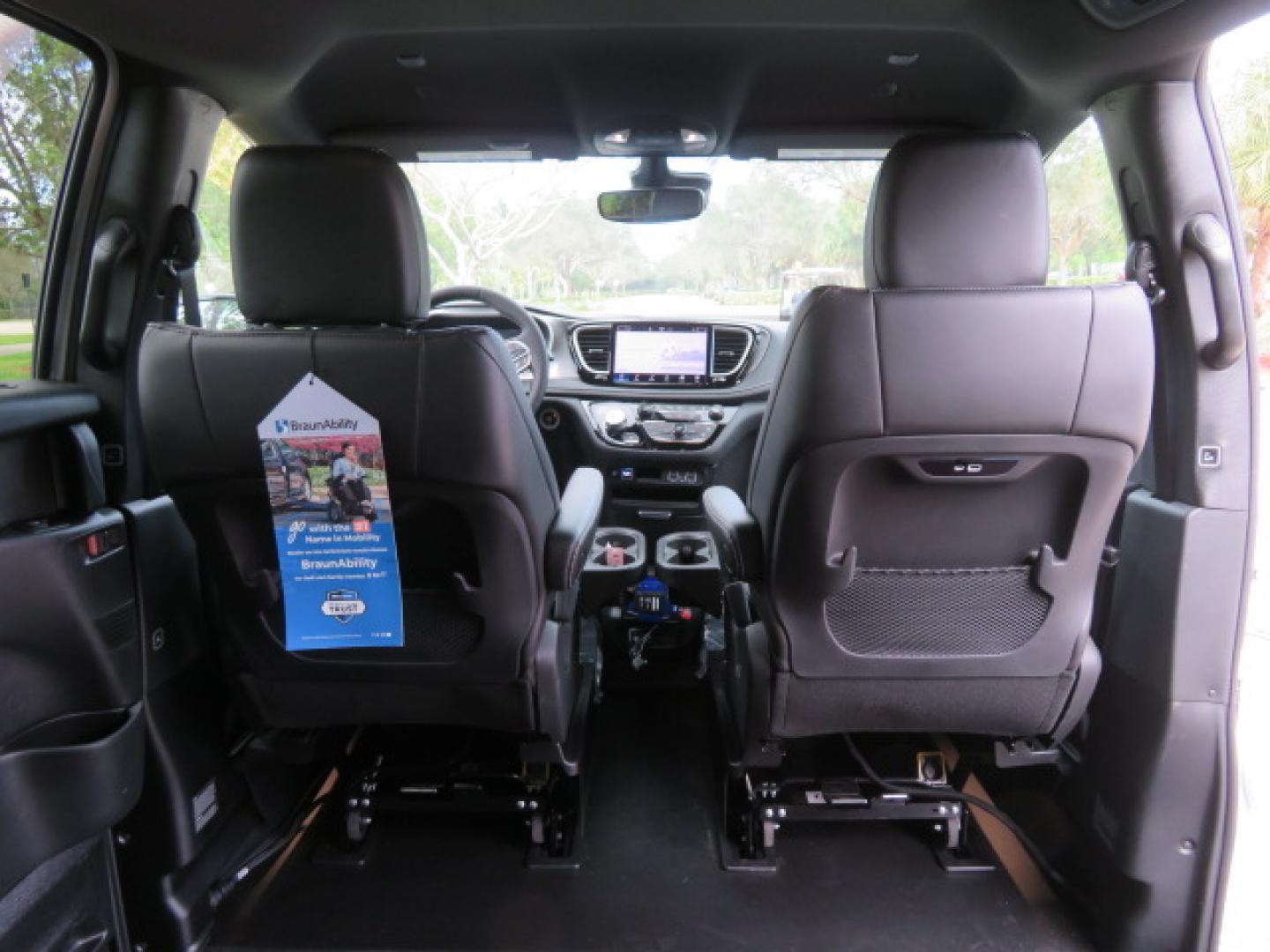 2025 White /Black Chrysler Pacifica Select (2C4RC1BG6SR) with an 3.6L V6 DOHC 24V engine, 9A transmission, located at 4301 Oak Circle #19, Boca Raton, FL, 33431, (954) 561-2499, 26.388472, -80.084045 - 2025 CHRYSLER PACIFICA SELECT Braunability Handicap Wheelchair Conversion with 280 Original Miles. Braun Power Foldout XT Ramp System. Clean Carfax No Stories. This van is Brand New. Still has original plastic from the facotry. Purchased new in November and the van was sold due to unfortunate circum - Photo#45