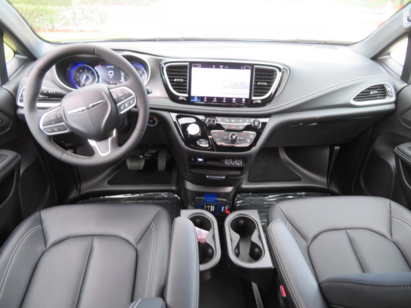 2025 White /Black Chrysler Pacifica Select (2C4RC1BG6SR) with an 3.6L V6 DOHC 24V engine, 9A transmission, located at 4301 Oak Circle #19, Boca Raton, FL, 33431, (954) 561-2499, 26.388472, -80.084045 - 2025 CHRYSLER PACIFICA SELECT Braunability Handicap Wheelchair Conversion with 280 Original Miles. Braun Power Foldout XT Ramp System. Clean Carfax No Stories. This van is Brand New. Still has original plastic from the facotry. Purchased new in November and the van was sold due to unfortunate circum - Photo#48