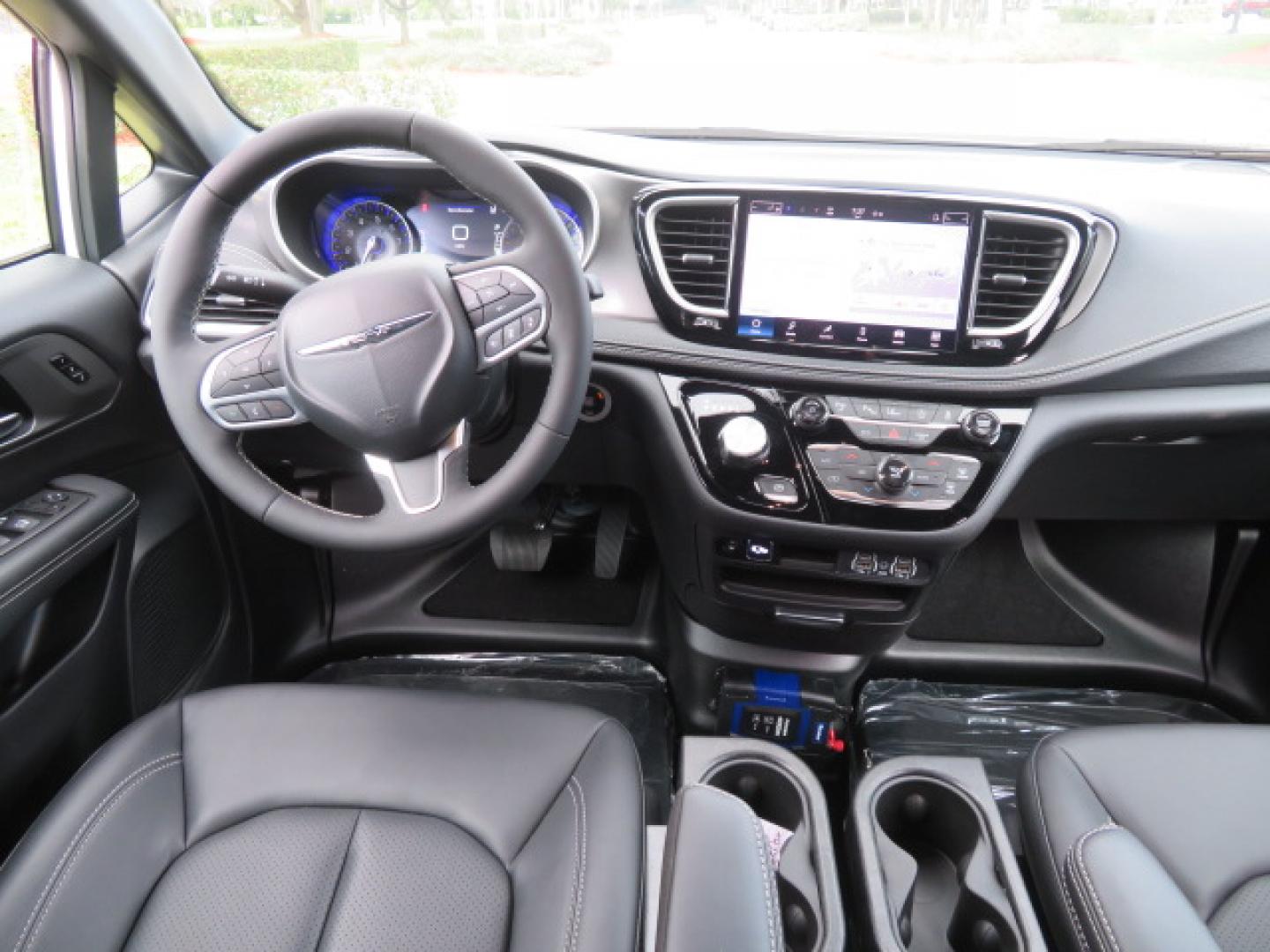 2025 White /Black Chrysler Pacifica Select (2C4RC1BG6SR) with an 3.6L V6 DOHC 24V engine, 9A transmission, located at 4301 Oak Circle #19, Boca Raton, FL, 33431, (954) 561-2499, 26.388472, -80.084045 - 2025 CHRYSLER PACIFICA SELECT Braunability Handicap Wheelchair Conversion with 280 Original Miles. Braun Power Foldout XT Ramp System. Clean Carfax No Stories. This van is Brand New. Still has original plastic from the facotry. Purchased new in November and the van was sold due to unfortunate circum - Photo#50