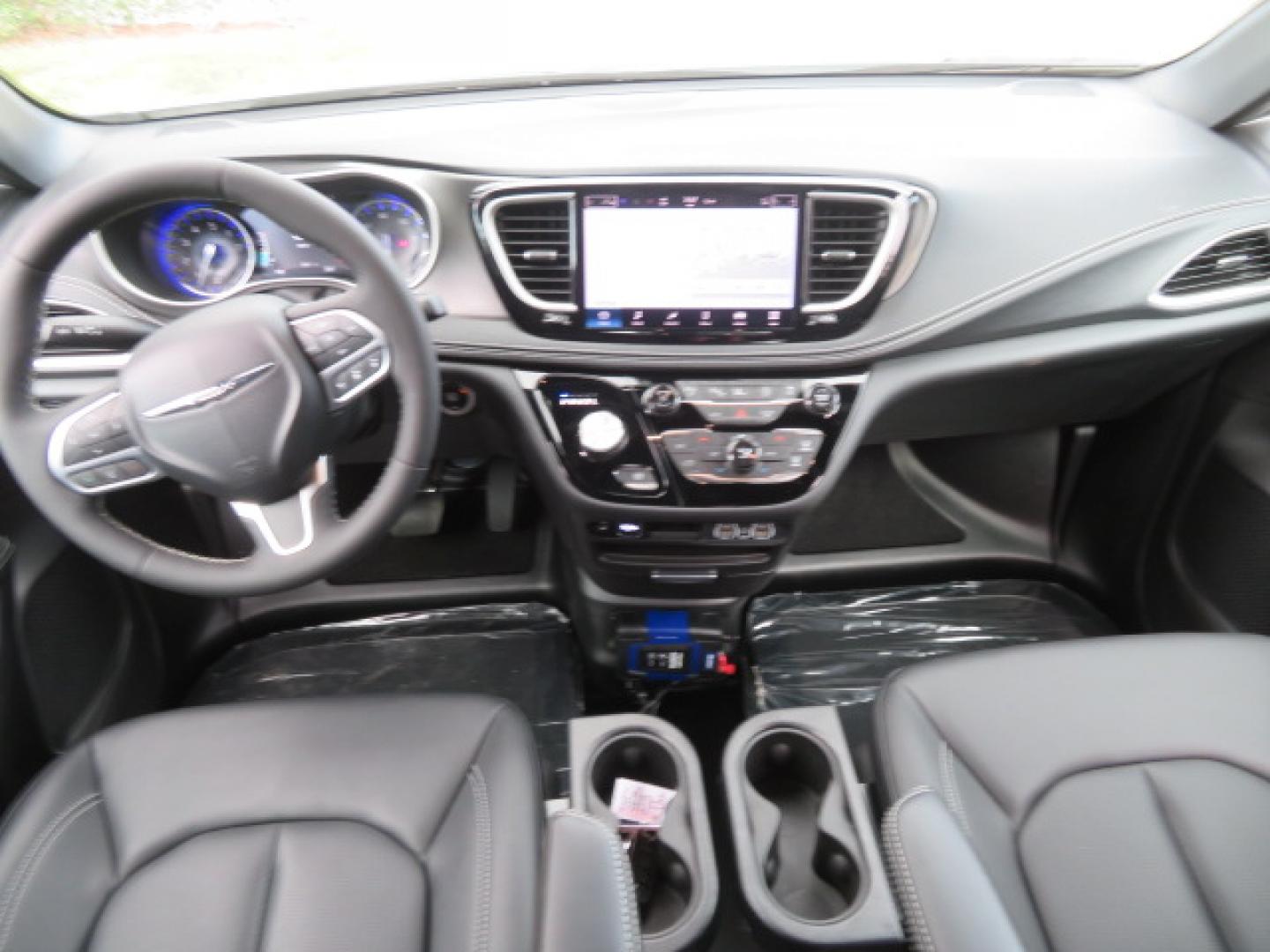 2025 White /Black Chrysler Pacifica Select (2C4RC1BG6SR) with an 3.6L V6 DOHC 24V engine, 9A transmission, located at 4301 Oak Circle #19, Boca Raton, FL, 33431, (954) 561-2499, 26.388472, -80.084045 - 2025 CHRYSLER PACIFICA SELECT Braunability Handicap Wheelchair Conversion with 280 Original Miles. Braun Power Foldout XT Ramp System. Clean Carfax No Stories. This van is Brand New. Still has original plastic from the facotry. Purchased new in November and the van was sold due to unfortunate circum - Photo#51