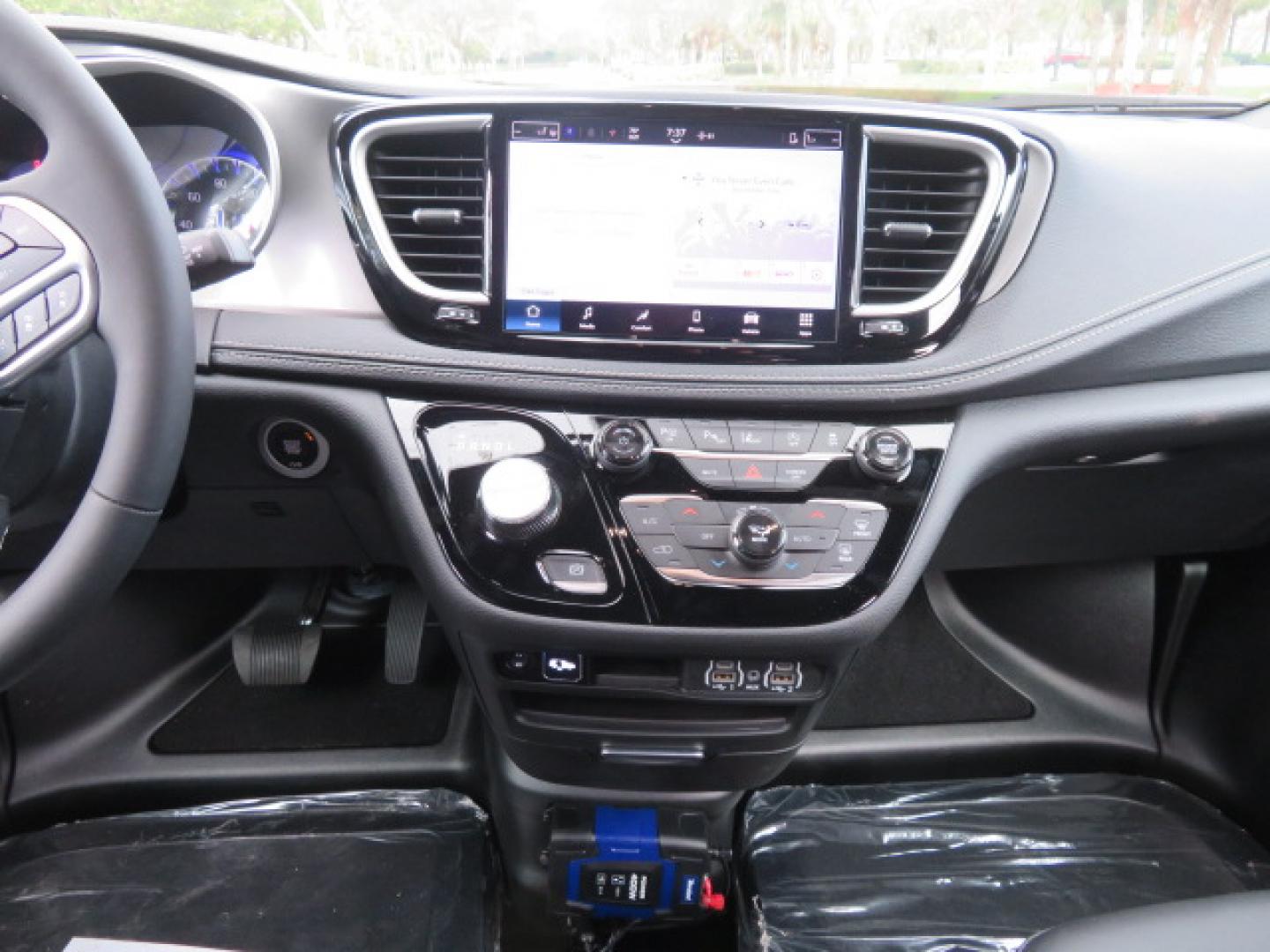 2025 White /Black Chrysler Pacifica Select (2C4RC1BG6SR) with an 3.6L V6 DOHC 24V engine, 9A transmission, located at 4301 Oak Circle #19, Boca Raton, FL, 33431, (954) 561-2499, 26.388472, -80.084045 - 2025 CHRYSLER PACIFICA SELECT Braunability Handicap Wheelchair Conversion with 280 Original Miles. Braun Power Foldout XT Ramp System. Clean Carfax No Stories. This van is Brand New. Still has original plastic from the facotry. Purchased new in November and the van was sold due to unfortunate circum - Photo#52