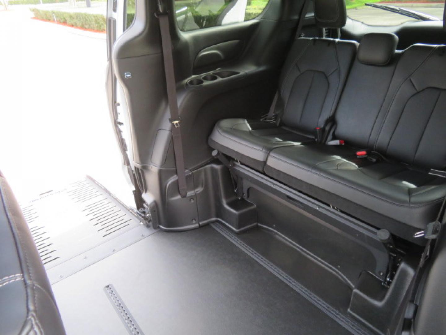 2025 White /Black Chrysler Pacifica Select (2C4RC1BG6SR) with an 3.6L V6 DOHC 24V engine, 9A transmission, located at 4301 Oak Circle #19, Boca Raton, FL, 33431, (954) 561-2499, 26.388472, -80.084045 - 2025 CHRYSLER PACIFICA SELECT Braunability Handicap Wheelchair Conversion with 280 Original Miles. Braun Power Foldout XT Ramp System. Clean Carfax No Stories. This van is Brand New. Still has original plastic from the facotry. Purchased new in November and the van was sold due to unfortunate circum - Photo#58