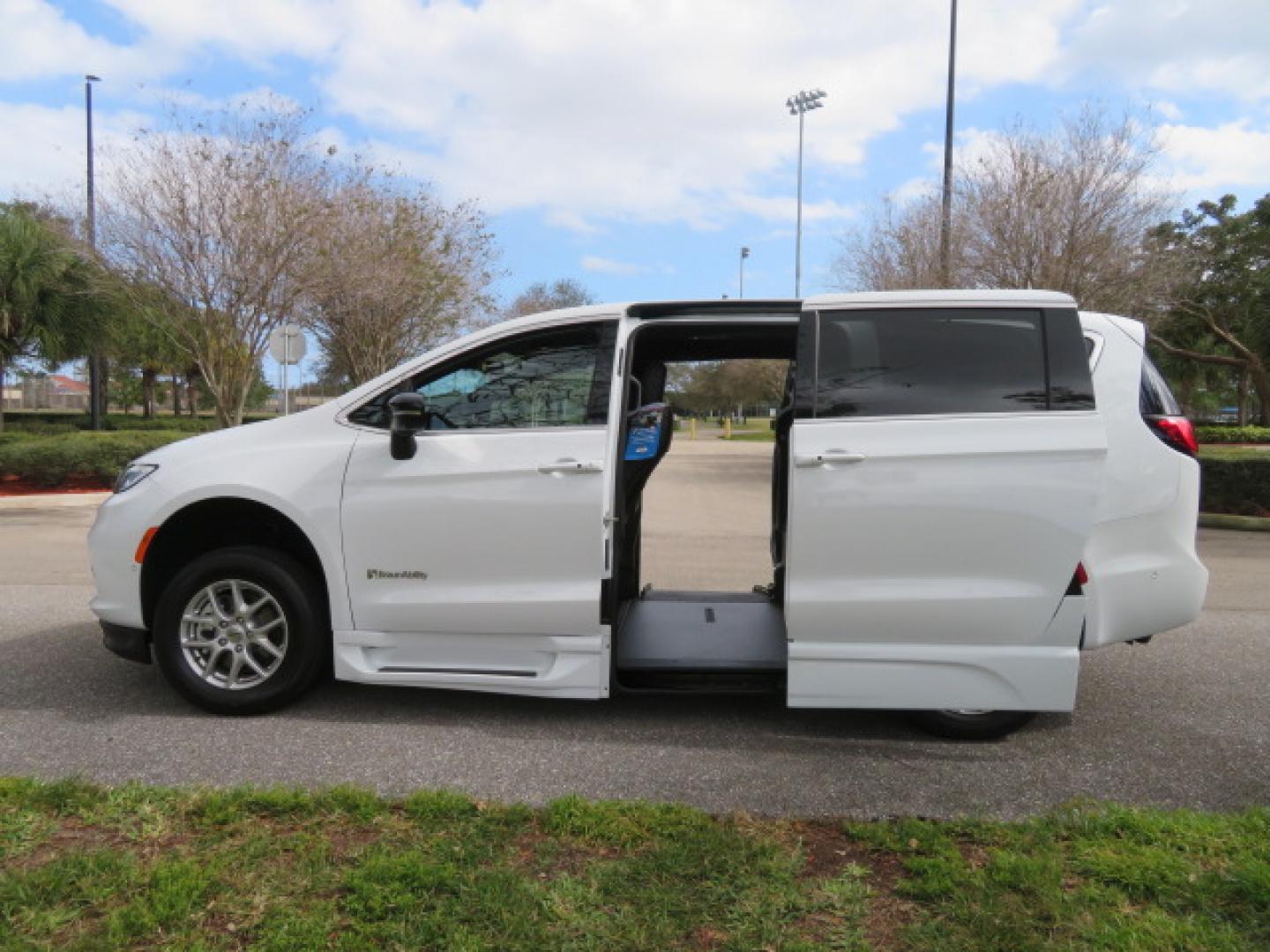 2025 White /Black Chrysler Pacifica Select (2C4RC1BG6SR) with an 3.6L V6 DOHC 24V engine, 9A transmission, located at 4301 Oak Circle #19, Boca Raton, FL, 33431, (954) 561-2499, 26.388472, -80.084045 - 2025 CHRYSLER PACIFICA SELECT Braunability Handicap Wheelchair Conversion with 280 Original Miles. Braun Power Foldout XT Ramp System. Clean Carfax No Stories. This van is Brand New. Still has original plastic from the facotry. Purchased new in November and the van was sold due to unfortunate circum - Photo#59