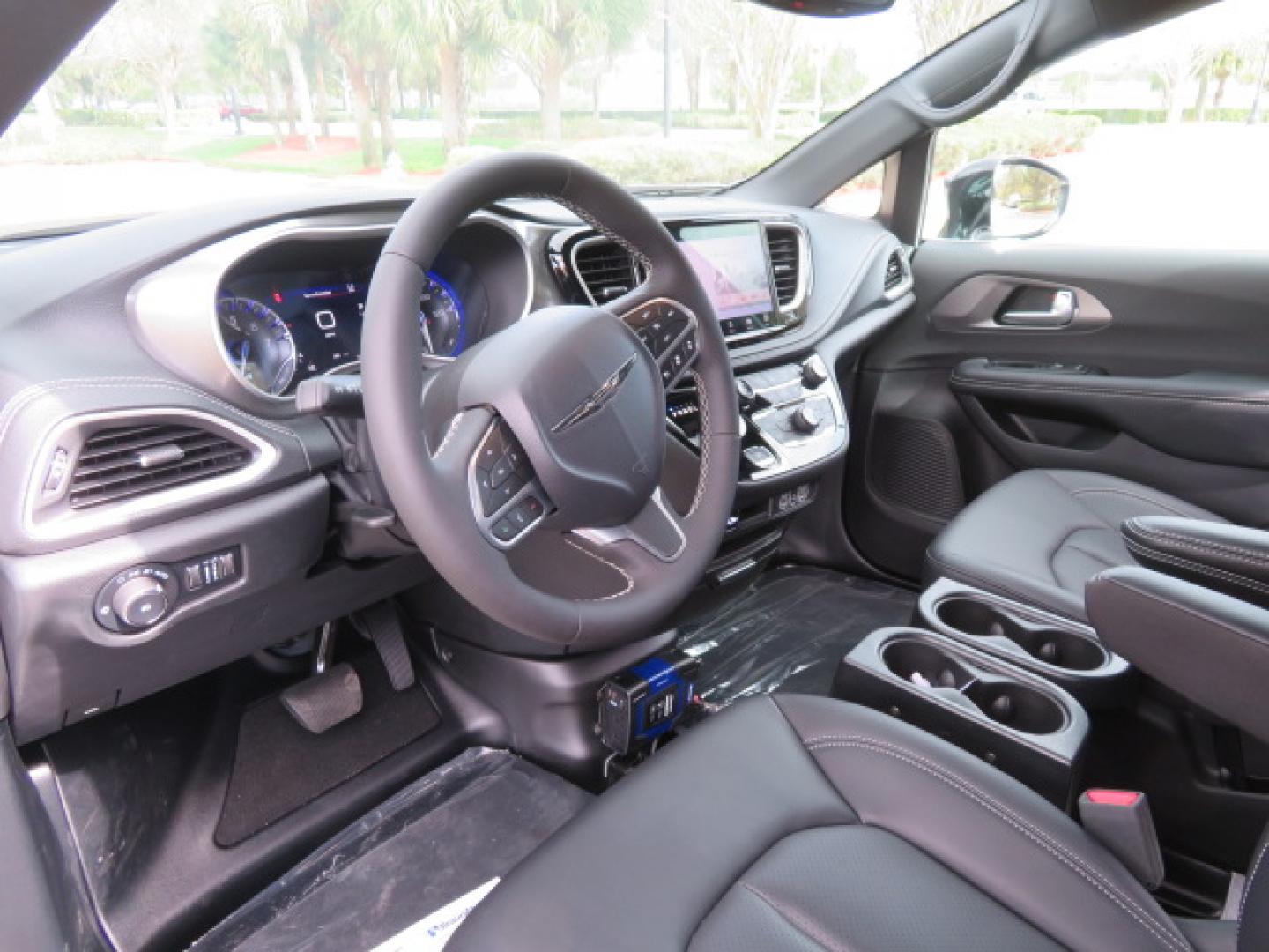 2025 White /Black Chrysler Pacifica Select (2C4RC1BG6SR) with an 3.6L V6 DOHC 24V engine, 9A transmission, located at 4301 Oak Circle #19, Boca Raton, FL, 33431, (954) 561-2499, 26.388472, -80.084045 - 2025 CHRYSLER PACIFICA SELECT Braunability Handicap Wheelchair Conversion with 280 Original Miles. Braun Power Foldout XT Ramp System. Clean Carfax No Stories. This van is Brand New. Still has original plastic from the facotry. Purchased new in November and the van was sold due to unfortunate circum - Photo#63