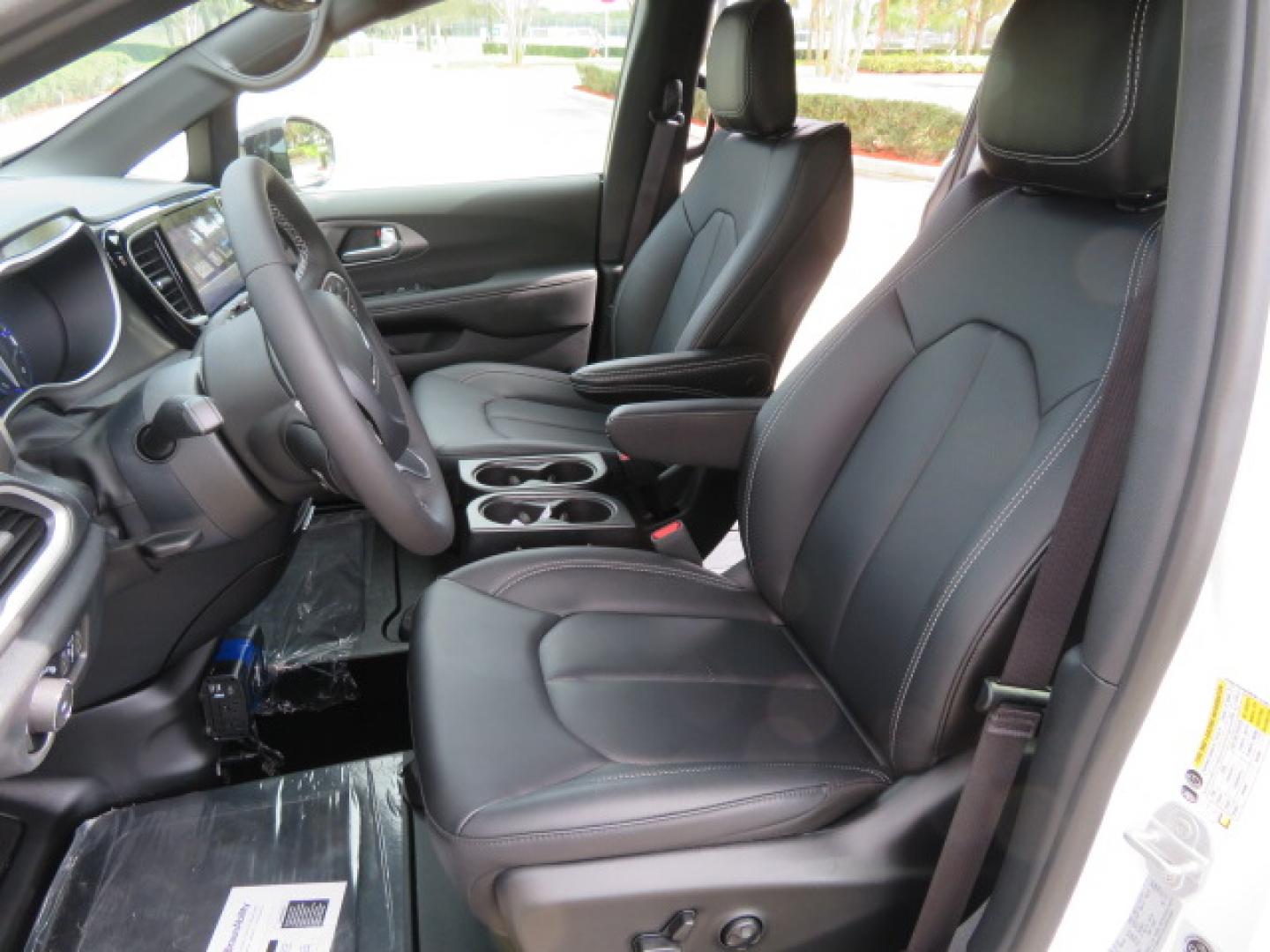 2025 White /Black Chrysler Pacifica Select (2C4RC1BG6SR) with an 3.6L V6 DOHC 24V engine, 9A transmission, located at 4301 Oak Circle #19, Boca Raton, FL, 33431, (954) 561-2499, 26.388472, -80.084045 - 2025 CHRYSLER PACIFICA SELECT Braunability Handicap Wheelchair Conversion with 280 Original Miles. Braun Power Foldout XT Ramp System. Clean Carfax No Stories. This van is Brand New. Still has original plastic from the facotry. Purchased new in November and the van was sold due to unfortunate circum - Photo#64