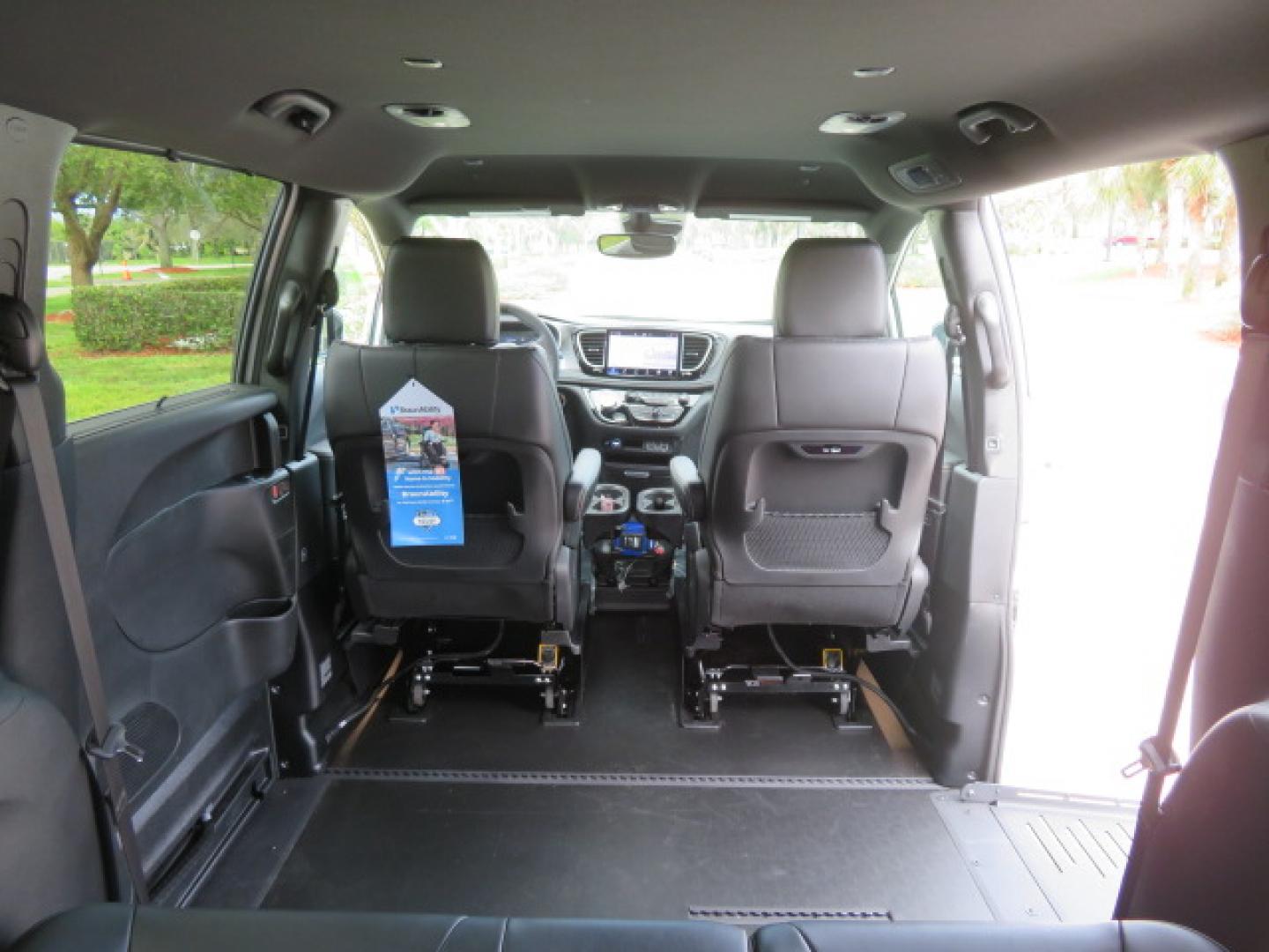 2025 White /Black Chrysler Pacifica Select (2C4RC1BG6SR) with an 3.6L V6 DOHC 24V engine, 9A transmission, located at 4301 Oak Circle #19, Boca Raton, FL, 33431, (954) 561-2499, 26.388472, -80.084045 - 2025 CHRYSLER PACIFICA SELECT Braunability Handicap Wheelchair Conversion with 280 Original Miles. Braun Power Foldout XT Ramp System. Clean Carfax No Stories. This van is Brand New. Still has original plastic from the facotry. Purchased new in November and the van was sold due to unfortunate circum - Photo#72