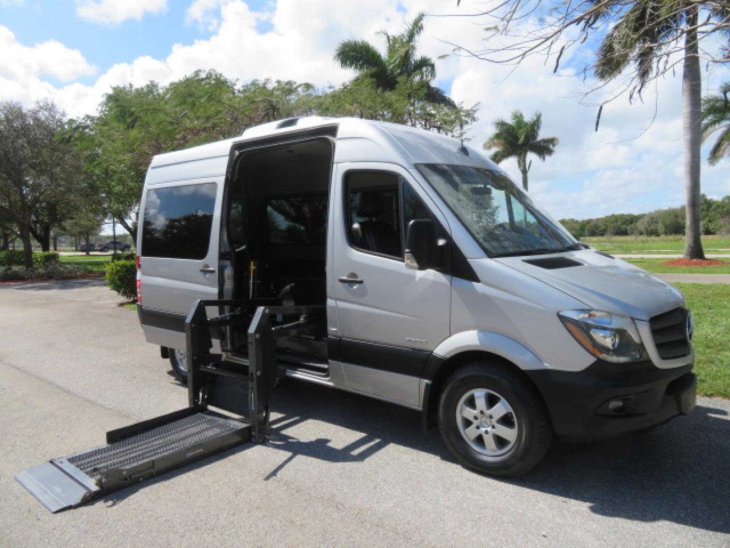 2016 Silver /Black Leather Mercedes-Benz Sprinter 2500 Passenger Van 144-in. WB (8BRPE7CD5GE) with an 3.0L V6 DOHC 24V TURBO DIESEL engine, 7A transmission, located at 4301 Oak Circle #19, Boca Raton, FL, 33431, (954) 561-2499, 26.388472, -80.084045 - You are looking at a Gorgeous 2016 Mercedes Sprinter Handicap Wheelchair Conversion Van with: 19K Original Miles, 2500, 3.0 Diesel, 2 Transfer Seats, Power Side Door with Remote, Braunability Power Folding Wheelchair Lift System, Tie Downs, Full Power, Leather Seats, Rubber Flooring, Brand New Tires - Photo#1