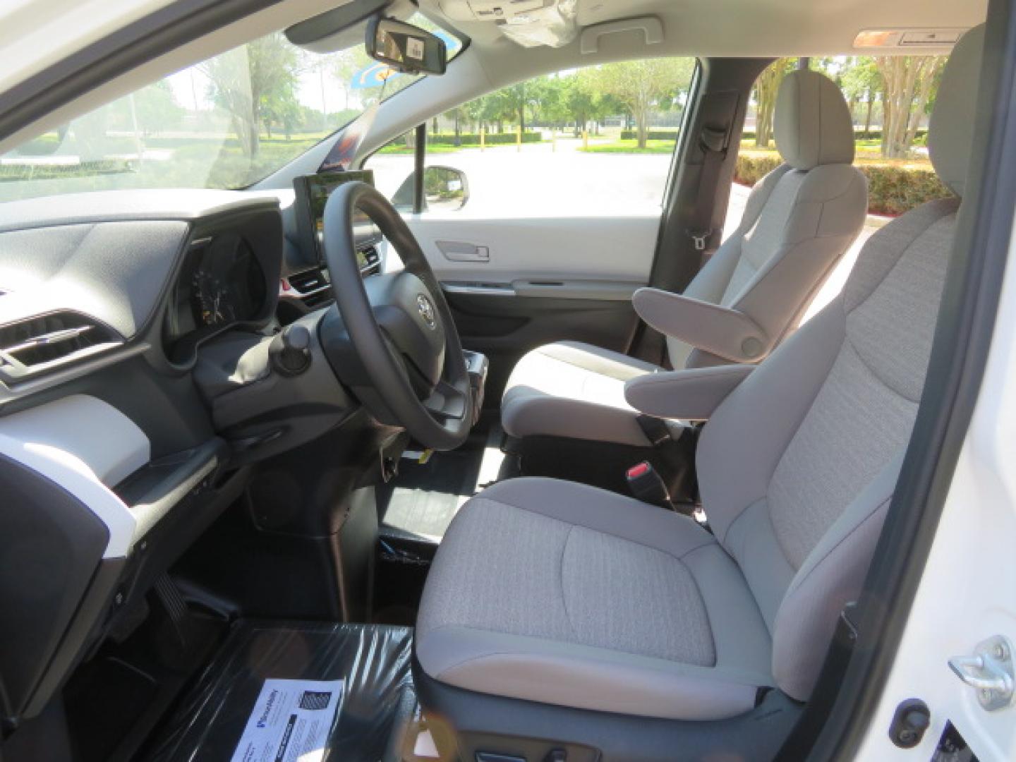 2026 White /Gray Toyota Sienna LE 8-Passenger (5TDKRKEC9TS) with an 2.5L L4 DOHC 16V HYBRID engine, CVT transmission, located at 4301 Oak Circle #19, Boca Raton, FL, 33431, (954) 561-2499, 26.388472, -80.084045 - Brand New 2026 Toyota Sienna LE Braunability Handicap Wheelchair Conversion Braunability XT Conversion Power Foldout Ramp Fully Loaded! Ask about our Dealer Rebate Programs! 954-561-2499. ?? JUST ARRIVED | BRAND NEW 2026 TOYOTA SIENNA LE ?? BraunAbility XT Power Wheelchair Conversion Experience u - Photo#76