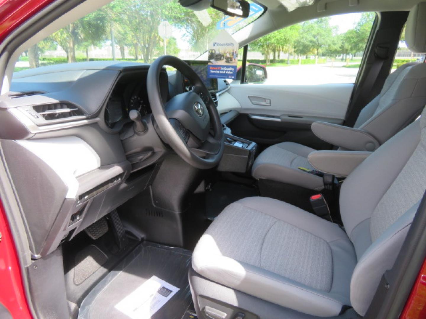 2026 Red /Gray Toyota Sienna LE 8-Passenger (5TDKRKEC7TS) with an 2.5L L4 DOHC 16V HYBRID engine, CVT transmission, located at 4301 Oak Circle #19, Boca Raton, FL, 33431, (954) 561-2499, 26.388472, -80.084045 - Brand New 2026 Toyota Sienna LE Braunability Handicap Wheelchair Conversion Braunability XT Conversion Power Foldout Ramp Fully Loaded! Ask about our Dealer Rebate Programs! 954-561-2499. ?? JUST ARRIVED | BRAND NEW 2026 TOYOTA SIENNA LE ?? BraunAbility XT Power Wheelchair Conversion Experience u - Photo#52