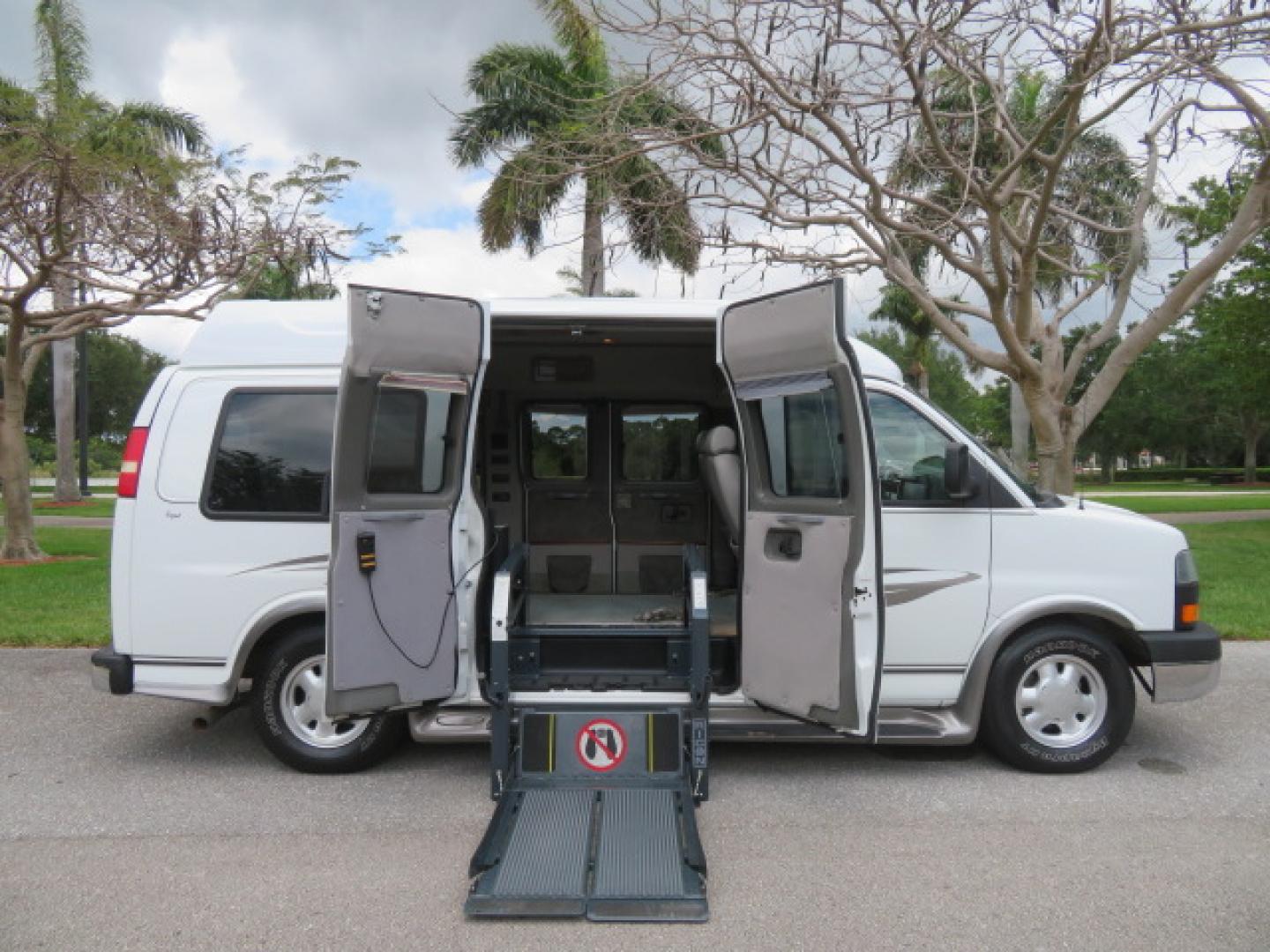 2004 White /Gray GMC Savana G1500 Cargo (1GDFG15T041) with an 5.3L V8 OHV 16V engine, 4-Speed Automatic Overdrive transmission, located at 4301 Oak Circle #19, Boca Raton, FL, 33431, (954) 561-2499, 26.388472, -80.084045 - ?? RARE LOW-MILEAGE 2004 GMC Savana High Top Handicap Wheelchair Van – ONLY 45K Original Miles! ?? Looking for a dependable wheelchair van, handicap accessible van, or mobility conversion van? This 2004 GMC Savana High Top Conversion Van is an exceptional find with just 45,000 original miles and - Photo#27
