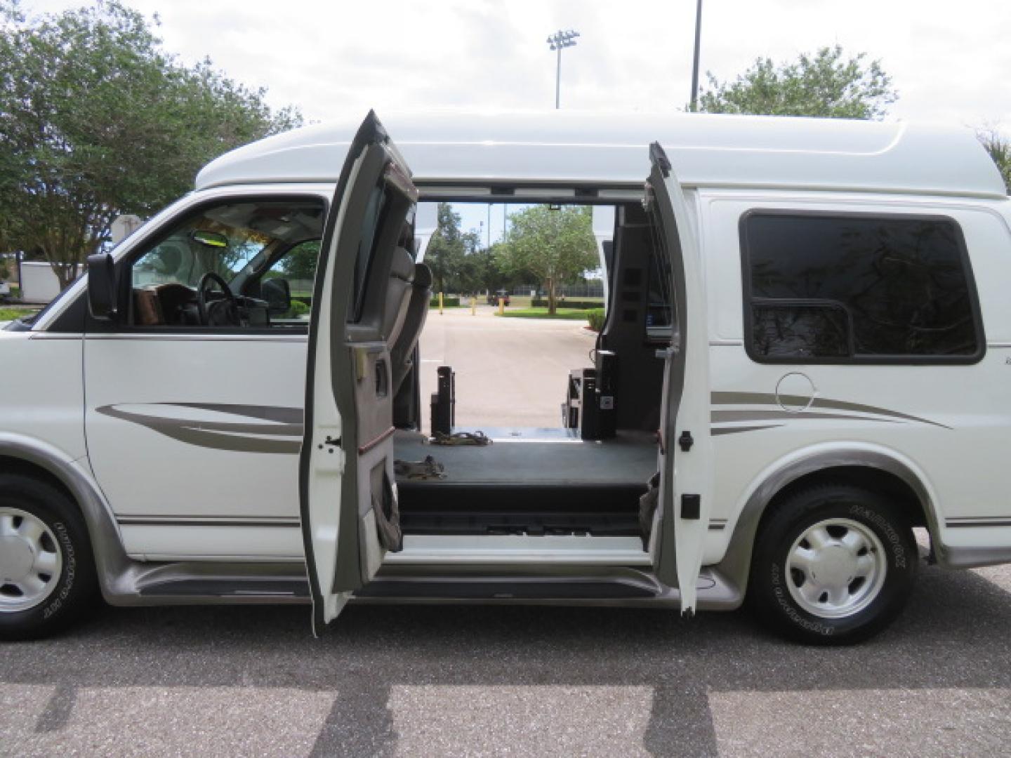 2004 White /Gray GMC Savana G1500 Cargo (1GDFG15T041) with an 5.3L V8 OHV 16V engine, 4-Speed Automatic Overdrive transmission, located at 4301 Oak Circle #19, Boca Raton, FL, 33431, (954) 561-2499, 26.388472, -80.084045 - ?? RARE LOW-MILEAGE 2004 GMC Savana High Top Handicap Wheelchair Van – ONLY 45K Original Miles! ?? Looking for a dependable wheelchair van, handicap accessible van, or mobility conversion van? This 2004 GMC Savana High Top Conversion Van is an exceptional find with just 45,000 original miles and - Photo#35
