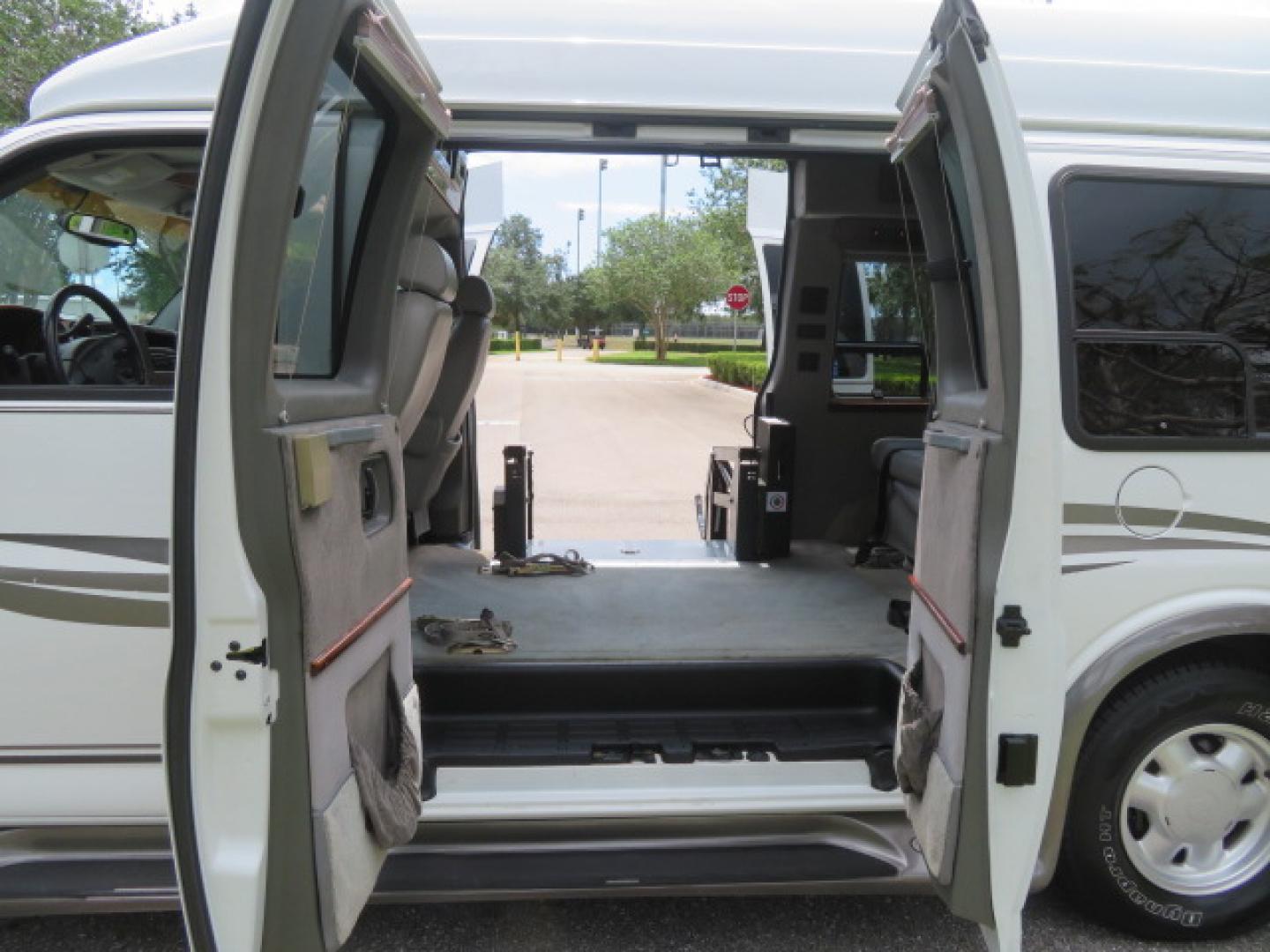 2004 White /Gray GMC Savana G1500 Cargo (1GDFG15T041) with an 5.3L V8 OHV 16V engine, 4-Speed Automatic Overdrive transmission, located at 4301 Oak Circle #19, Boca Raton, FL, 33431, (954) 561-2499, 26.388472, -80.084045 - ?? RARE LOW-MILEAGE 2004 GMC Savana High Top Handicap Wheelchair Van – ONLY 45K Original Miles! ?? Looking for a dependable wheelchair van, handicap accessible van, or mobility conversion van? This 2004 GMC Savana High Top Conversion Van is an exceptional find with just 45,000 original miles and - Photo#36