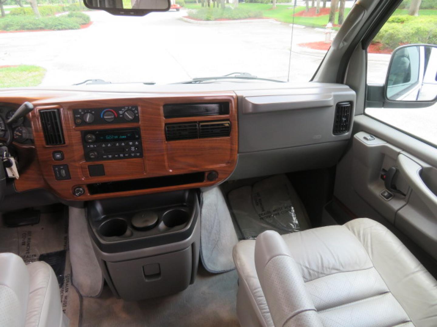 2004 White /Gray GMC Savana G1500 Cargo (1GDFG15T041) with an 5.3L V8 OHV 16V engine, 4-Speed Automatic Overdrive transmission, located at 4301 Oak Circle #19, Boca Raton, FL, 33431, (954) 561-2499, 26.388472, -80.084045 - ?? RARE LOW-MILEAGE 2004 GMC Savana High Top Handicap Wheelchair Van – ONLY 45K Original Miles! ?? Looking for a dependable wheelchair van, handicap accessible van, or mobility conversion van? This 2004 GMC Savana High Top Conversion Van is an exceptional find with just 45,000 original miles and - Photo#49