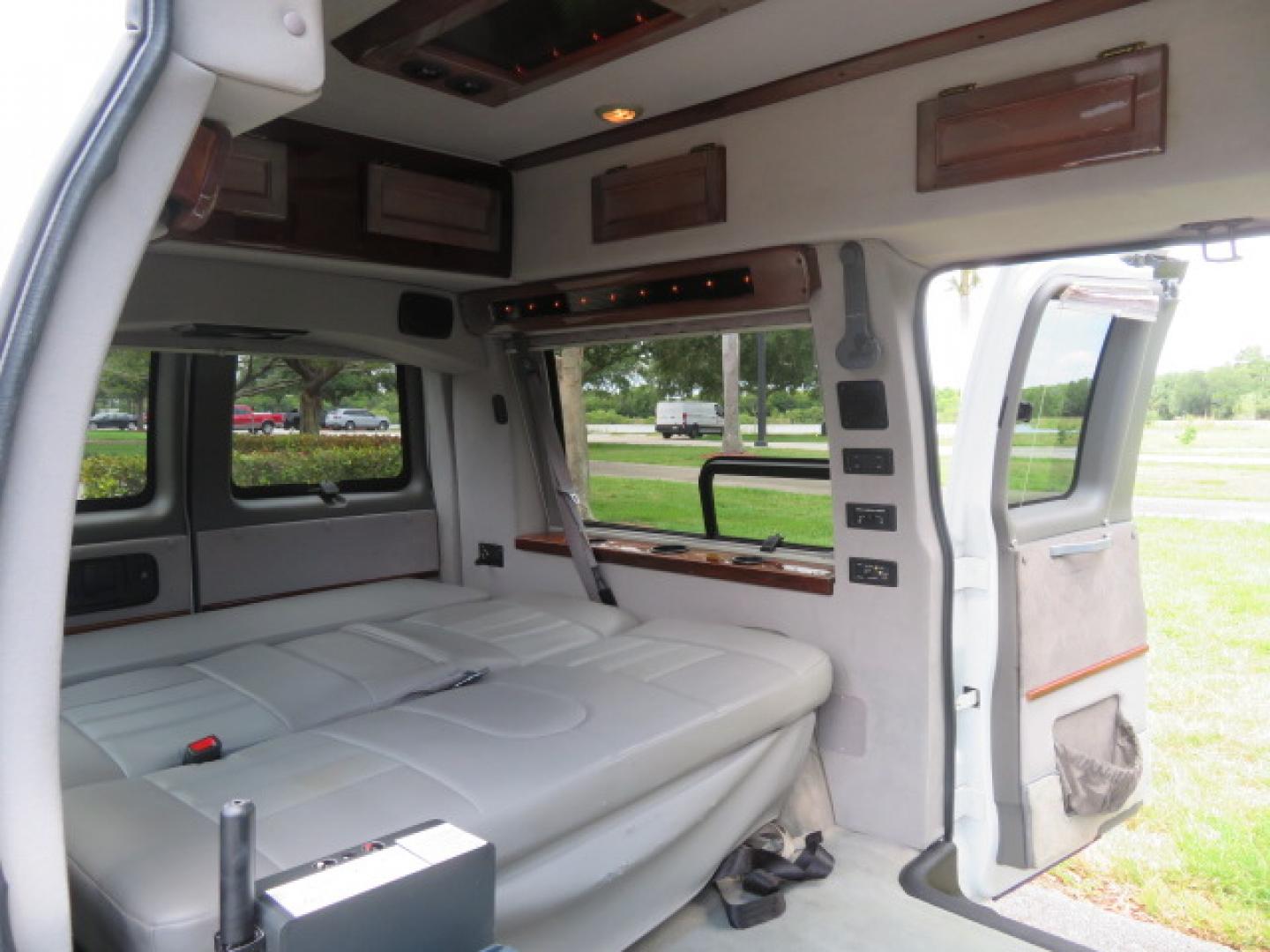 2004 White /Gray GMC Savana G1500 Cargo (1GDFG15T041) with an 5.3L V8 OHV 16V engine, 4-Speed Automatic Overdrive transmission, located at 4301 Oak Circle #19, Boca Raton, FL, 33431, (954) 561-2499, 26.388472, -80.084045 - ?? RARE LOW-MILEAGE 2004 GMC Savana High Top Handicap Wheelchair Van – ONLY 45K Original Miles! ?? Looking for a dependable wheelchair van, handicap accessible van, or mobility conversion van? This 2004 GMC Savana High Top Conversion Van is an exceptional find with just 45,000 original miles and - Photo#71