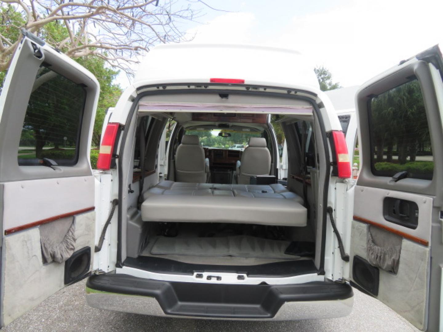 2004 White /Gray GMC Savana G1500 Cargo (1GDFG15T041) with an 5.3L V8 OHV 16V engine, 4-Speed Automatic Overdrive transmission, located at 4301 Oak Circle #19, Boca Raton, FL, 33431, (954) 561-2499, 26.388472, -80.084045 - ?? RARE LOW-MILEAGE 2004 GMC Savana High Top Handicap Wheelchair Van – ONLY 45K Original Miles! ?? Looking for a dependable wheelchair van, handicap accessible van, or mobility conversion van? This 2004 GMC Savana High Top Conversion Van is an exceptional find with just 45,000 original miles and - Photo#72