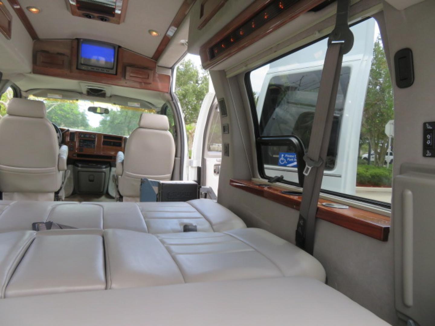 2004 White /Gray GMC Savana G1500 Cargo (1GDFG15T041) with an 5.3L V8 OHV 16V engine, 4-Speed Automatic Overdrive transmission, located at 4301 Oak Circle #19, Boca Raton, FL, 33431, (954) 561-2499, 26.388472, -80.084045 - ?? RARE LOW-MILEAGE 2004 GMC Savana High Top Handicap Wheelchair Van – ONLY 45K Original Miles! ?? Looking for a dependable wheelchair van, handicap accessible van, or mobility conversion van? This 2004 GMC Savana High Top Conversion Van is an exceptional find with just 45,000 original miles and - Photo#77