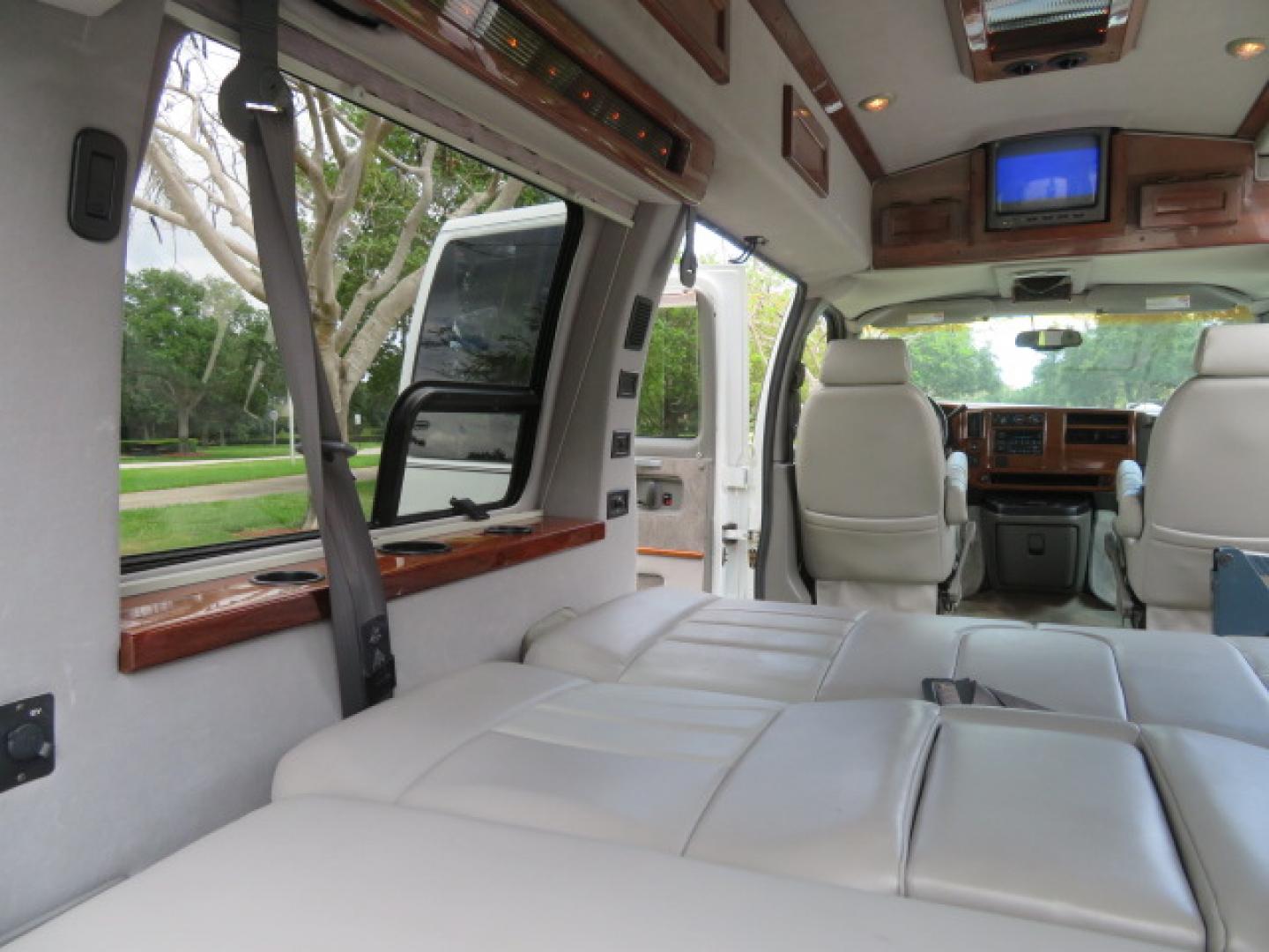 2004 White /Gray GMC Savana G1500 Cargo (1GDFG15T041) with an 5.3L V8 OHV 16V engine, 4-Speed Automatic Overdrive transmission, located at 4301 Oak Circle #19, Boca Raton, FL, 33431, (954) 561-2499, 26.388472, -80.084045 - ?? RARE LOW-MILEAGE 2004 GMC Savana High Top Handicap Wheelchair Van – ONLY 45K Original Miles! ?? Looking for a dependable wheelchair van, handicap accessible van, or mobility conversion van? This 2004 GMC Savana High Top Conversion Van is an exceptional find with just 45,000 original miles and - Photo#78