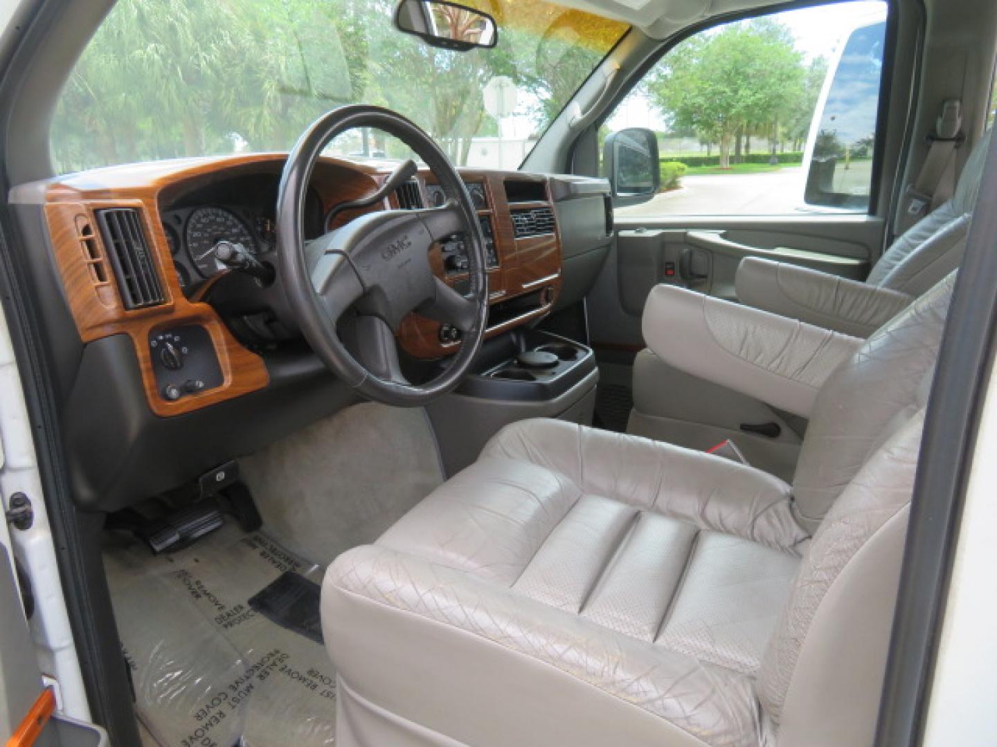 2004 White /Gray GMC Savana G1500 Cargo (1GDFG15T041) with an 5.3L V8 OHV 16V engine, 4-Speed Automatic Overdrive transmission, located at 4301 Oak Circle #19, Boca Raton, FL, 33431, (954) 561-2499, 26.388472, -80.084045 - ?? RARE LOW-MILEAGE 2004 GMC Savana High Top Handicap Wheelchair Van – ONLY 45K Original Miles! ?? Looking for a dependable wheelchair van, handicap accessible van, or mobility conversion van? This 2004 GMC Savana High Top Conversion Van is an exceptional find with just 45,000 original miles and - Photo#81