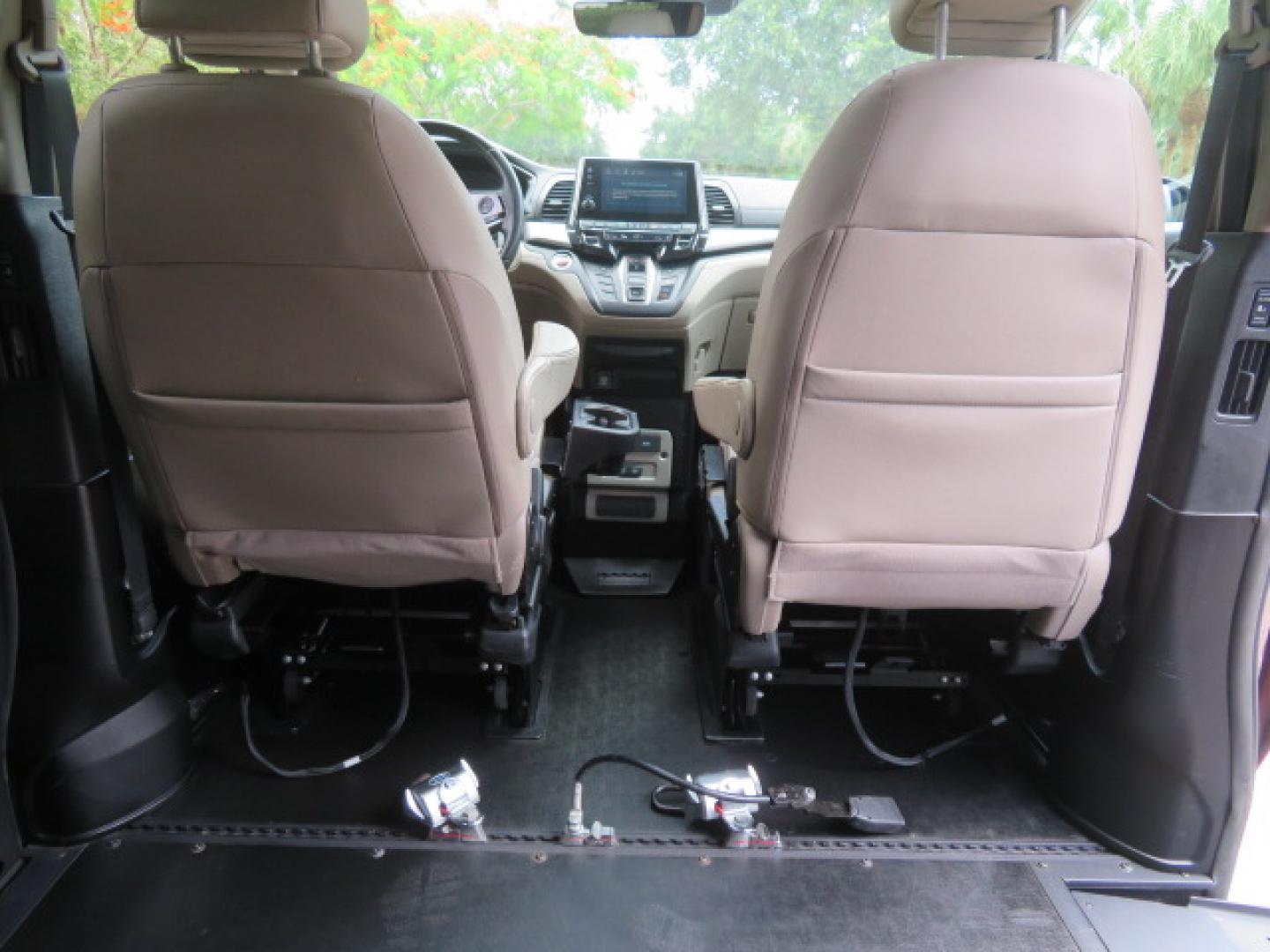 2018 Honda Odyssey EXR (5FNRL6H71JB) with an 3.5L V6 SOHC 24V engine, 6A transmission, located at 4301 Oak Circle #19, Boca Raton, FL, 33431, (954) 561-2499, 26.388472, -80.084045 - ? **2018 Honda Odyssey BraunAbility XI Wheelchair Accessible Van** ? **Quality. Reliability. Accessibility.** Looking for a dependable, low-mileage wheelchair accessible van? This **2018 Honda Odyssey BraunAbility XI** is in **excellent condition inside and out** and is ready for its next owne- Photo#49