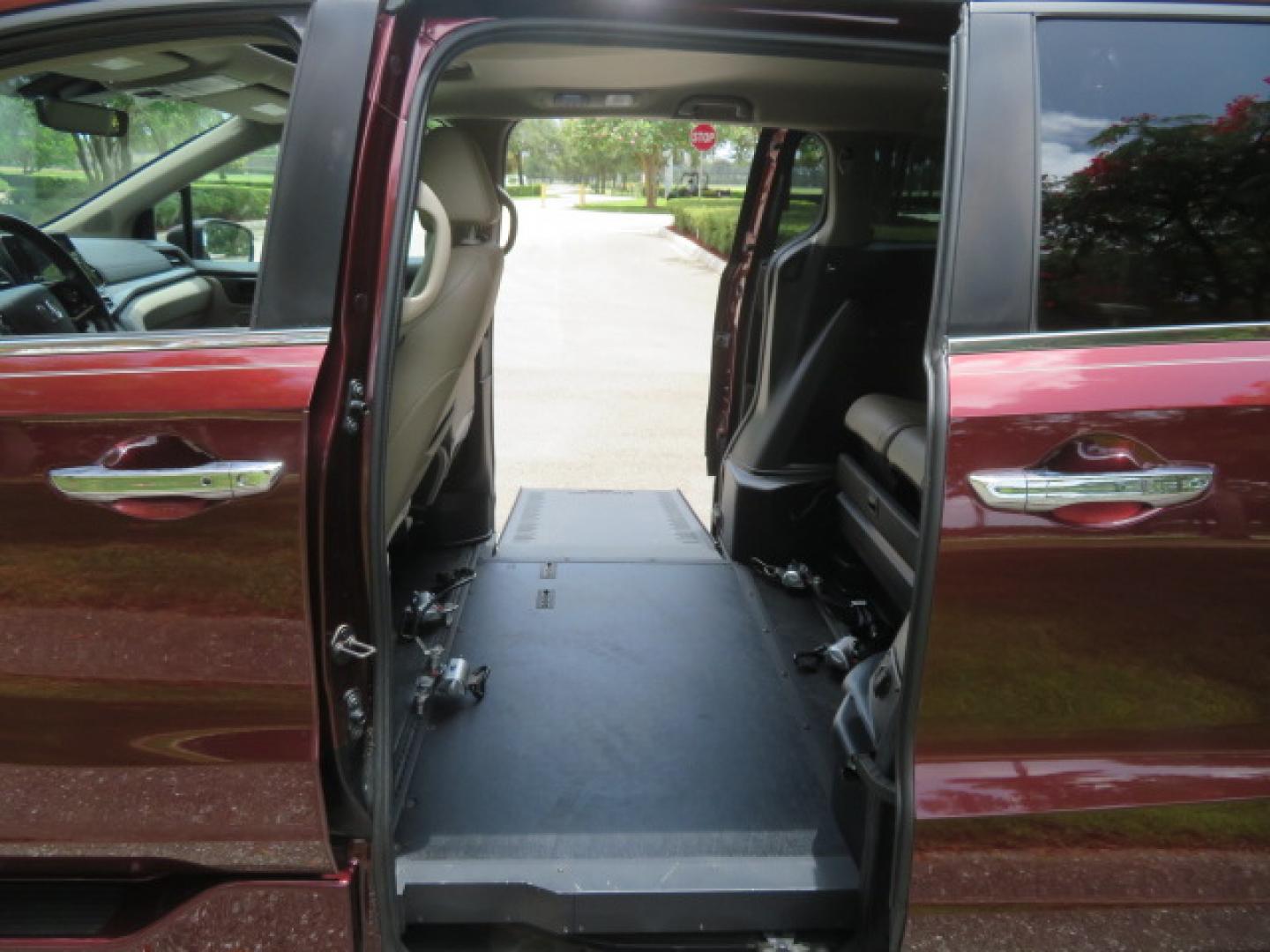 2018 Honda Odyssey EXR (5FNRL6H71JB) with an 3.5L V6 SOHC 24V engine, 6A transmission, located at 4301 Oak Circle #19, Boca Raton, FL, 33431, (954) 561-2499, 26.388472, -80.084045 - ? **2018 Honda Odyssey BraunAbility XI Wheelchair Accessible Van** ? **Quality. Reliability. Accessibility.** Looking for a dependable, low-mileage wheelchair accessible van? This **2018 Honda Odyssey BraunAbility XI** is in **excellent condition inside and out** and is ready for its next owne- Photo#59