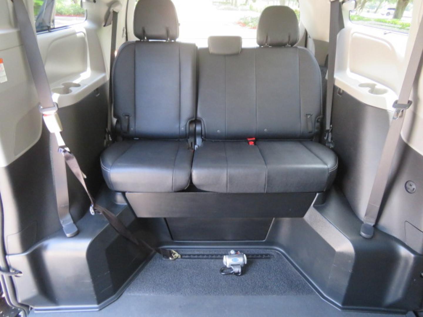 2017 Black /Black Toyota Sienna SE 8-Passenger (5TDXZ3DC2HS) with an 3.5L V6 EFI DOHC 24V engine, 8A transmission, located at 4301 Oak Circle #19, Boca Raton, FL, 33431, (954) 561-2499, 26.388472, -80.084045 - You are looking at Gorgeous Low Mileage Black on Black Garage Kept 2017 Toyota Sienna SE Sport Handicap Van Wheelchair Van VMI Conversion Van with 21K Original Miles, Power Side Entry Ramp with Kneeling Van Function, Q Straint Tie Down System. Quick Release Front Seats, Driver's Transfer Seat, Hand- Photo#52