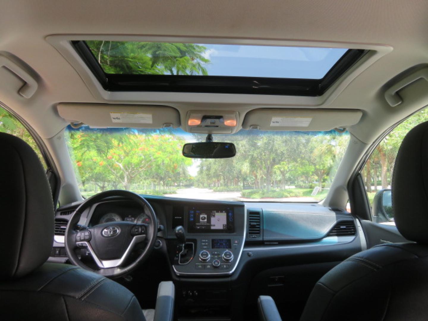 2017 Black /Black Toyota Sienna SE 8-Passenger (5TDXZ3DC2HS) with an 3.5L V6 EFI DOHC 24V engine, 8A transmission, located at 4301 Oak Circle #19, Boca Raton, FL, 33431, (954) 561-2499, 26.388472, -80.084045 - You are looking at Gorgeous Low Mileage Black on Black Garage Kept 2017 Toyota Sienna SE Sport Handicap Van Wheelchair Van VMI Conversion Van with 21K Original Miles, Power Side Entry Ramp with Kneeling Van Function, Q Straint Tie Down System. Quick Release Front Seats, Driver's Transfer Seat, Hand- Photo#56
