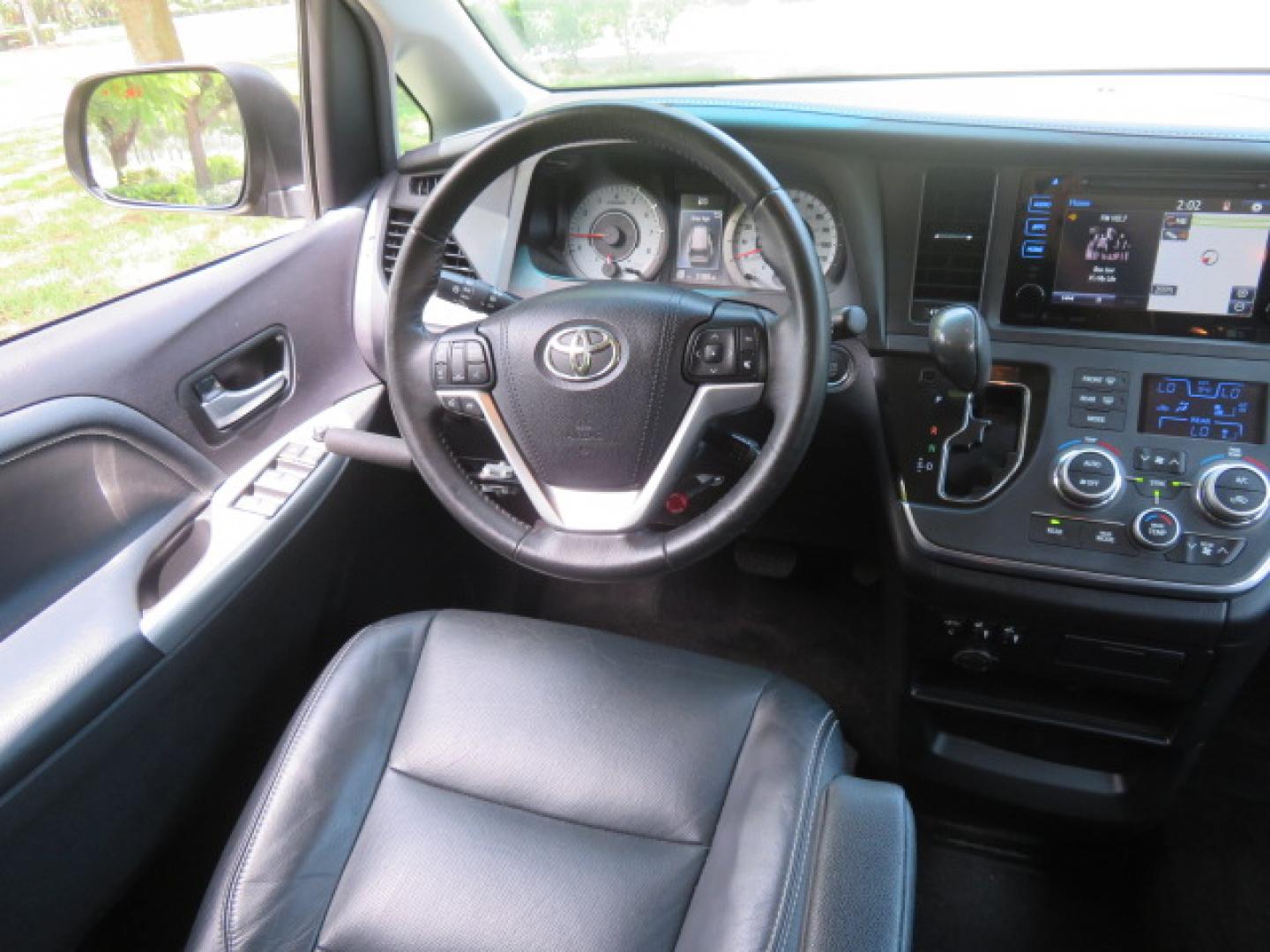 2017 Black /Black Toyota Sienna SE 8-Passenger (5TDXZ3DC2HS) with an 3.5L V6 EFI DOHC 24V engine, 8A transmission, located at 4301 Oak Circle #19, Boca Raton, FL, 33431, (954) 561-2499, 26.388472, -80.084045 - You are looking at Gorgeous Low Mileage Black on Black Garage Kept 2017 Toyota Sienna SE Sport Handicap Van Wheelchair Van VMI Conversion Van with 21K Original Miles, Power Side Entry Ramp with Kneeling Van Function, Q Straint Tie Down System. Quick Release Front Seats, Driver's Transfer Seat, Hand- Photo#64