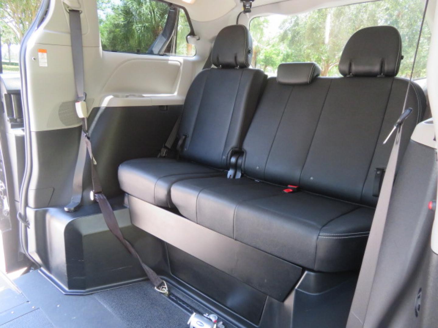2017 Black /Black Toyota Sienna SE 8-Passenger (5TDXZ3DC2HS) with an 3.5L V6 EFI DOHC 24V engine, 8A transmission, located at 4301 Oak Circle #19, Boca Raton, FL, 33431, (954) 561-2499, 26.388472, -80.084045 - You are looking at Gorgeous Low Mileage Black on Black Garage Kept 2017 Toyota Sienna SE Sport Handicap Van Wheelchair Van VMI Conversion Van with 21K Original Miles, Power Side Entry Ramp with Kneeling Van Function, Q Straint Tie Down System. Quick Release Front Seats, Driver's Transfer Seat, Hand- Photo#67