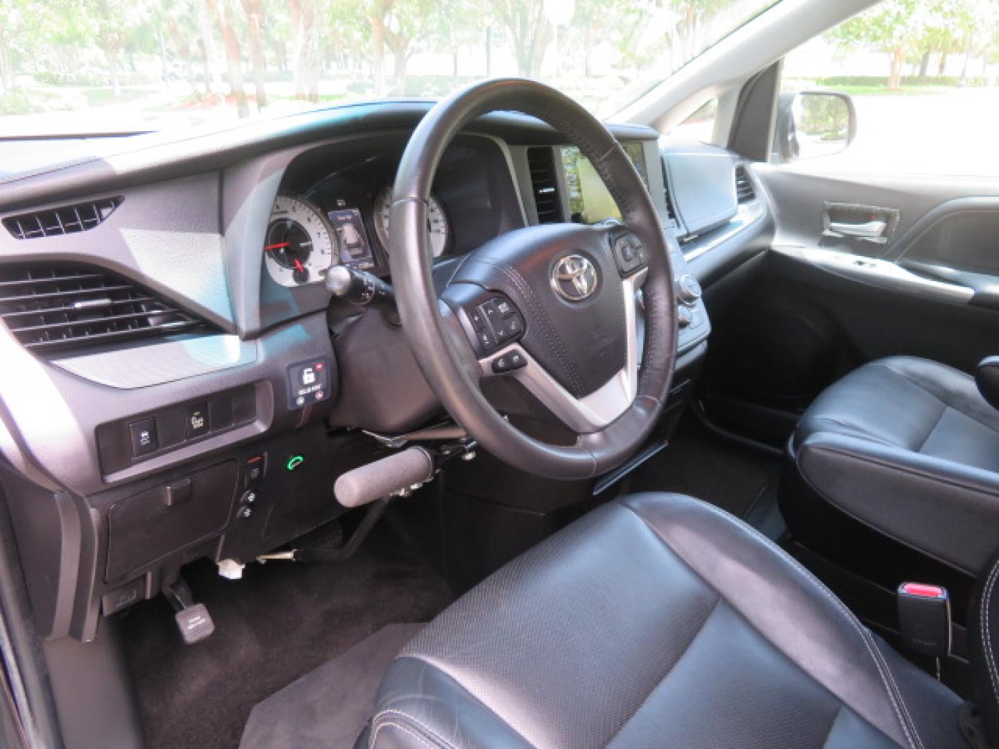 2017 Black /Black Toyota Sienna SE 8-Passenger (5TDXZ3DC2HS) with an 3.5L V6 EFI DOHC 24V engine, 8A transmission, located at 4301 Oak Circle #19, Boca Raton, FL, 33431, (954) 561-2499, 26.388472, -80.084045 - You are looking at Gorgeous Low Mileage Black on Black Garage Kept 2017 Toyota Sienna SE Sport Handicap Van Wheelchair Van VMI Conversion Van with 21K Original Miles, Power Side Entry Ramp with Kneeling Van Function, Q Straint Tie Down System. Quick Release Front Seats, Driver's Transfer Seat, Hand- Photo#68