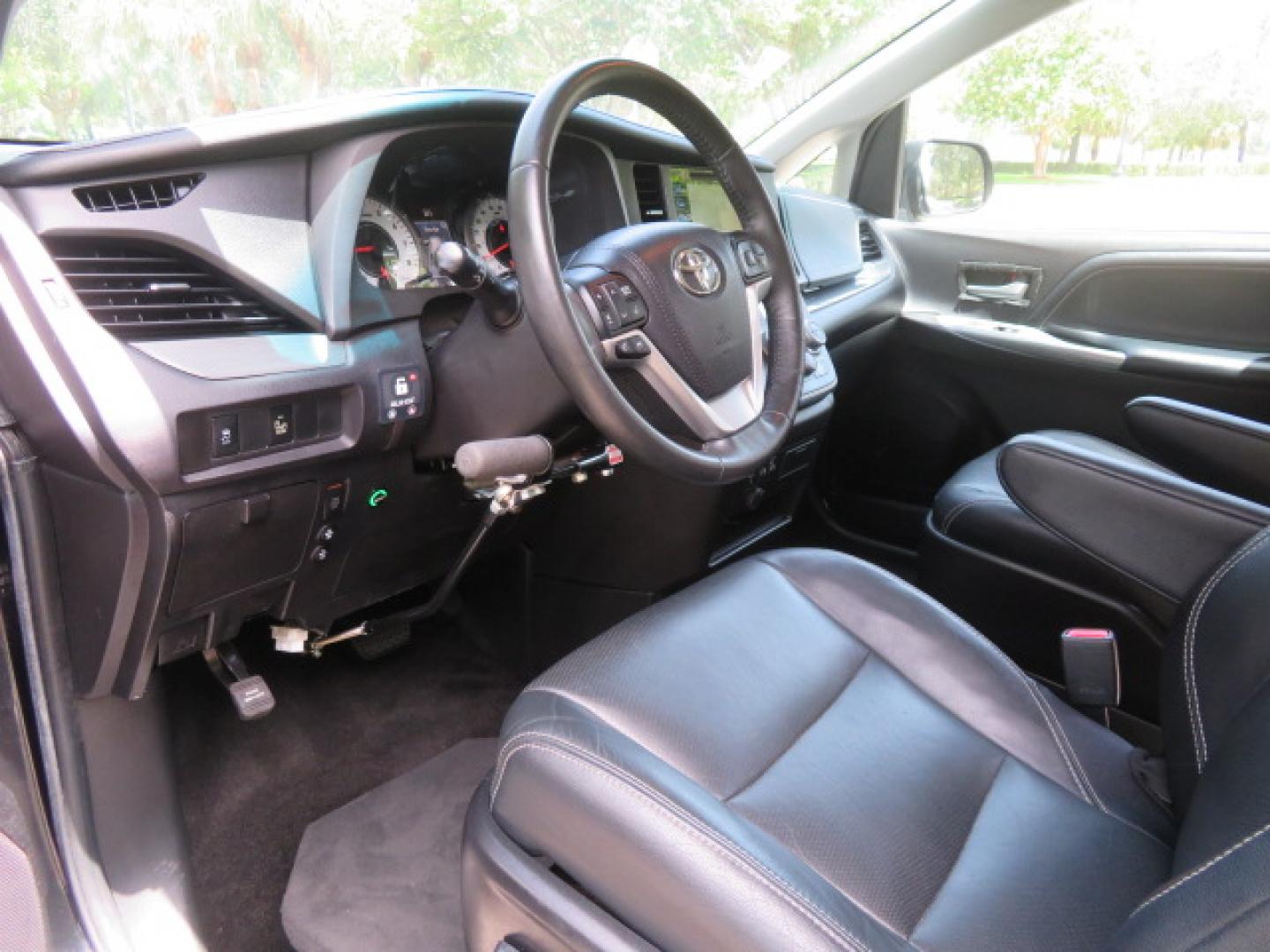 2017 Black /Black Toyota Sienna SE 8-Passenger (5TDXZ3DC2HS) with an 3.5L V6 EFI DOHC 24V engine, 8A transmission, located at 4301 Oak Circle #19, Boca Raton, FL, 33431, (954) 561-2499, 26.388472, -80.084045 - You are looking at Gorgeous Low Mileage Black on Black Garage Kept 2017 Toyota Sienna SE Sport Handicap Van Wheelchair Van VMI Conversion Van with 21K Original Miles, Power Side Entry Ramp with Kneeling Van Function, Q Straint Tie Down System. Quick Release Front Seats, Driver's Transfer Seat, Hand- Photo#73