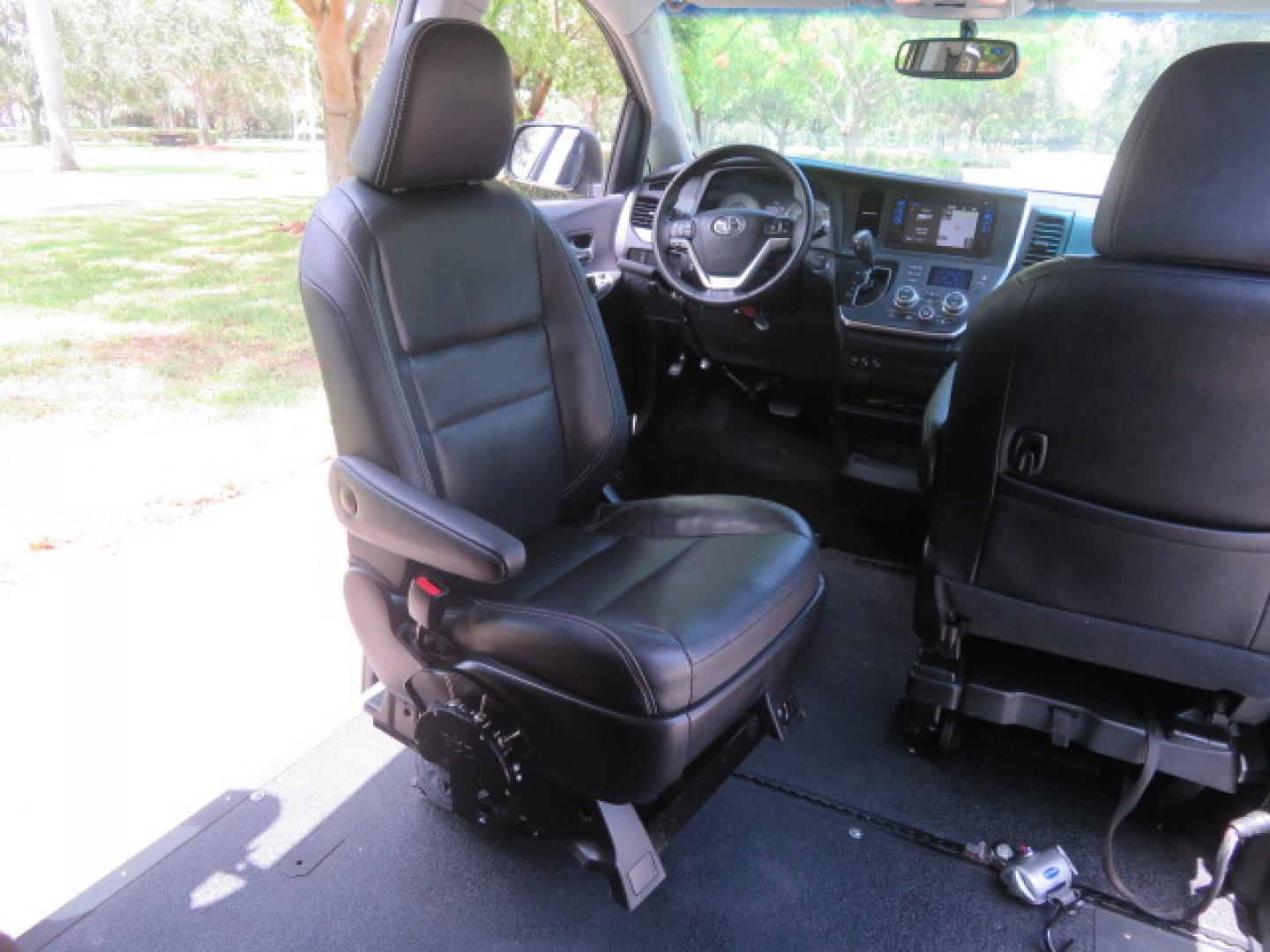 2017 Black /Black Toyota Sienna SE 8-Passenger (5TDXZ3DC2HS) with an 3.5L V6 EFI DOHC 24V engine, 8A transmission, located at 4301 Oak Circle #19, Boca Raton, FL, 33431, (954) 561-2499, 26.388472, -80.084045 - You are looking at Gorgeous Low Mileage Black on Black Garage Kept 2017 Toyota Sienna SE Sport Handicap Van Wheelchair Van VMI Conversion Van with 21K Original Miles, Power Side Entry Ramp with Kneeling Van Function, Q Straint Tie Down System. Quick Release Front Seats, Driver's Transfer Seat, Hand- Photo#77