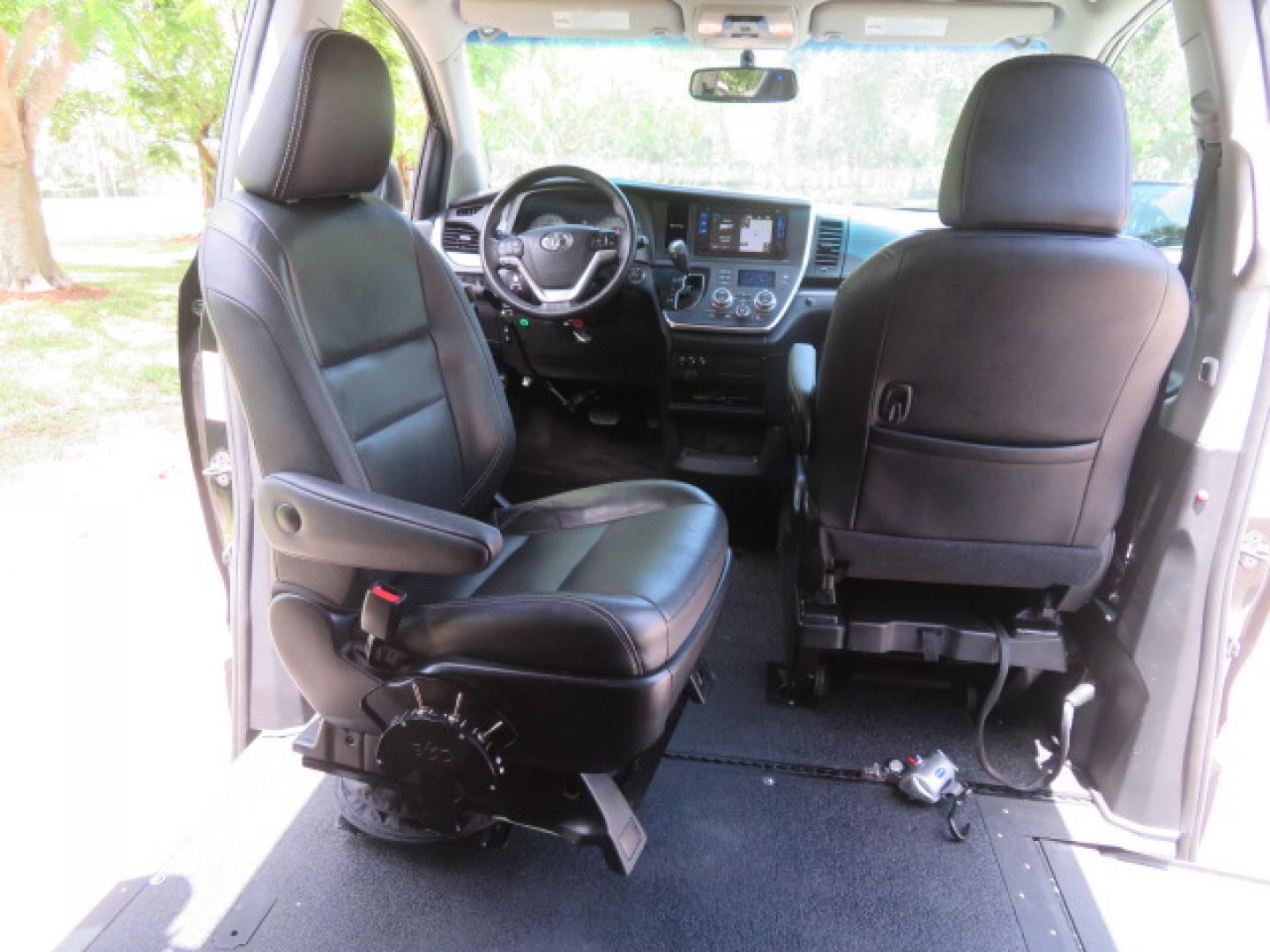 2017 Black /Black Toyota Sienna SE 8-Passenger (5TDXZ3DC2HS) with an 3.5L V6 EFI DOHC 24V engine, 8A transmission, located at 4301 Oak Circle #19, Boca Raton, FL, 33431, (954) 561-2499, 26.388472, -80.084045 - You are looking at Gorgeous Low Mileage Black on Black Garage Kept 2017 Toyota Sienna SE Sport Handicap Van Wheelchair Van VMI Conversion Van with 21K Original Miles, Power Side Entry Ramp with Kneeling Van Function, Q Straint Tie Down System. Quick Release Front Seats, Driver's Transfer Seat, Hand- Photo#78
