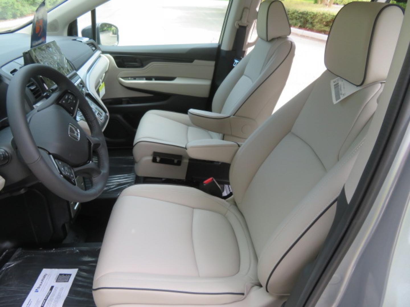 2026 Silver /Light Gray Honda Odyssey Touring (5FNRL6H80TB) with an 3.5L V6 SOHC 24V engine, Automatic transmission, located at 4301 Oak Circle #19, Boca Raton, FL, 33431, (954) 561-2499, 26.388472, -80.084045- Photo#61
