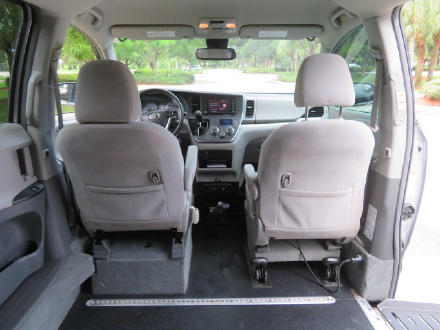 2018 Silver /Gray Toyota Sienna LE 8-Passenger (5TDKZ3DC7JS) with an 3.5L V6 EFI DOHC 24V engine, 8A transmission, located at 4301 Oak Circle #19, Boca Raton, FL, 33431, (954) 561-2499, 26.388472, -80.084045 - ? 2018 TOYOTA SIENNA POWER SIDE-ENTRY WHEELCHAIR VAN — IMMACULATE! ?? Looking for a clean, reliable Toyota Sienna handicap wheelchair van? This one deserves a serious look! ? 2018 Toyota Sienna ? Power Side-Entry Wheelchair Conversion ? Immaculate Condition Inside & Out ? Clean Carfax ? Clea- Photo#39
